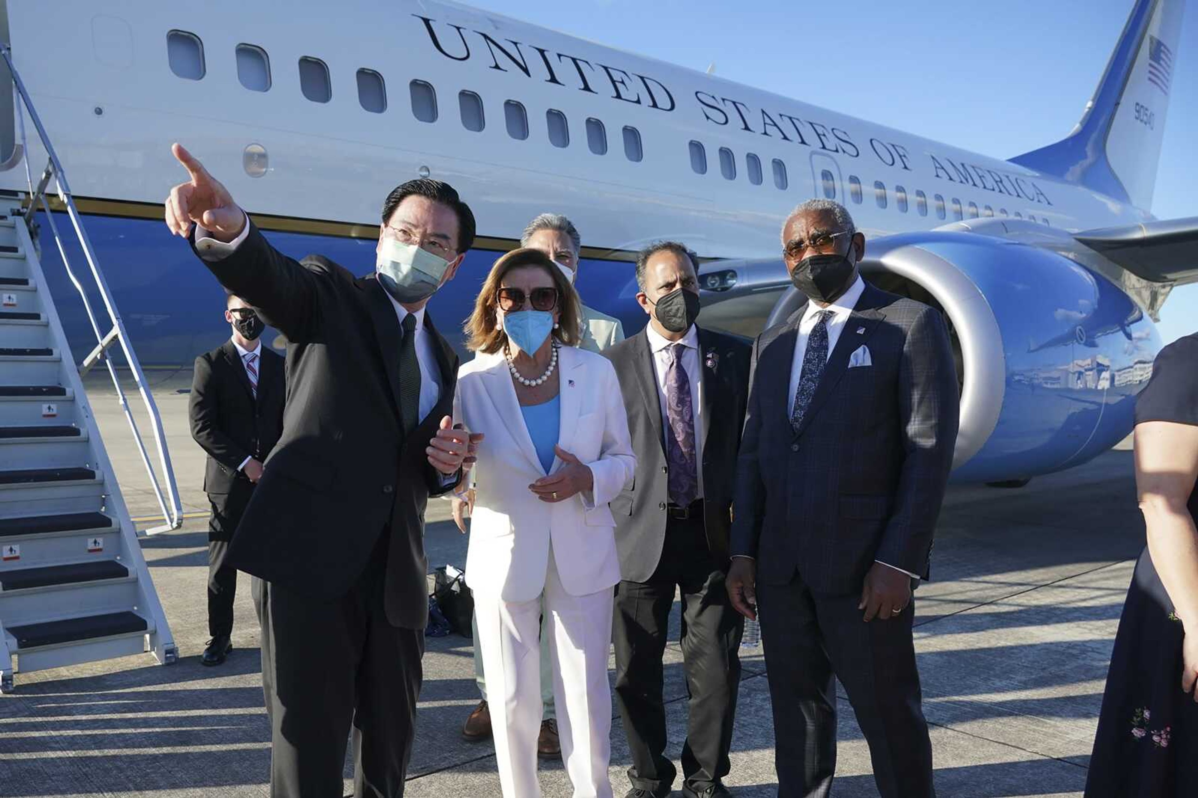 Taiwan's Foreign Minister Joseph Wu, left, gestures while speaking with U.S. House Speaker Nancy Pelosi Aug. 3 as she prepares to leave Taipei, Taiwan.