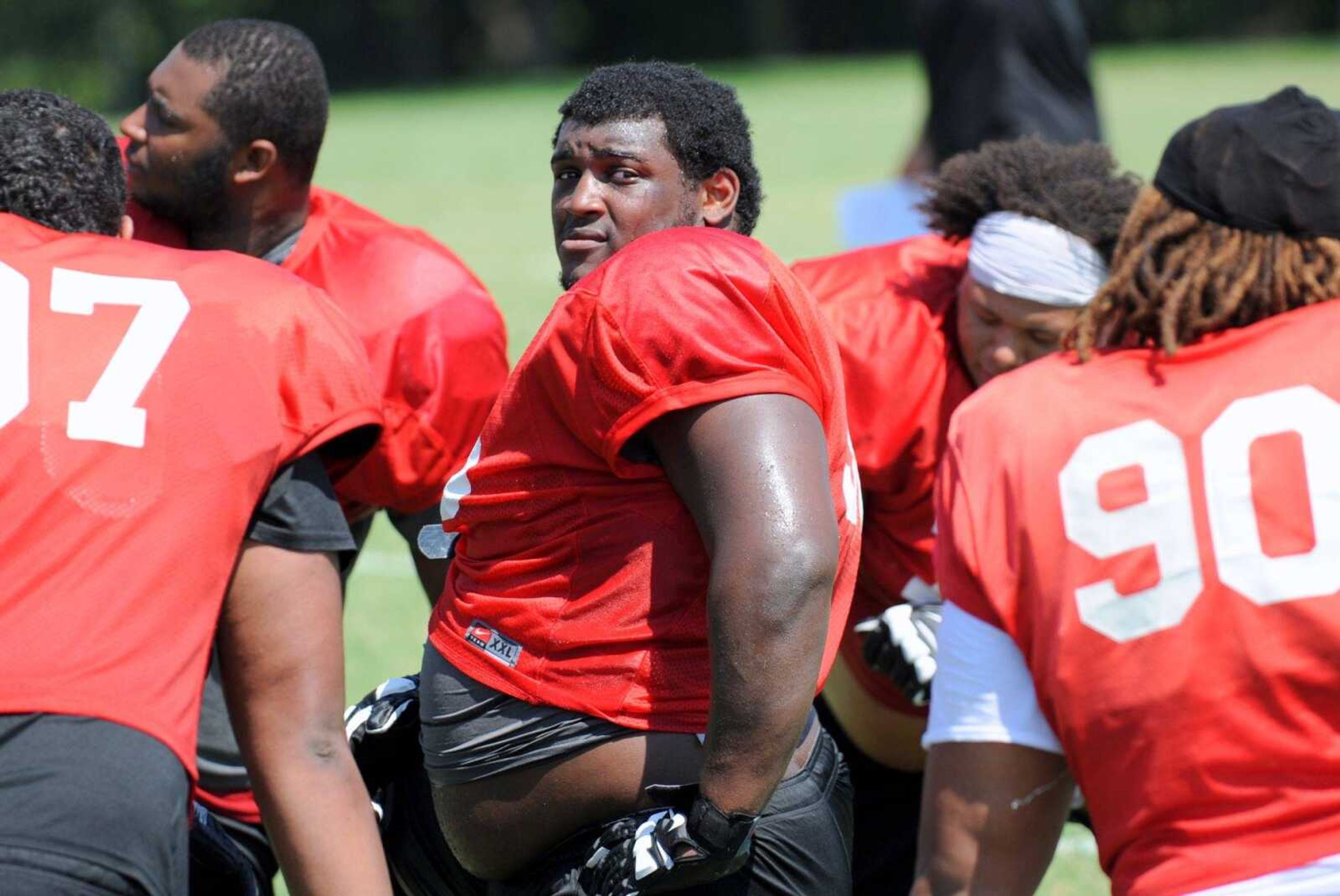 Southeast Missouri State nose tackle Joshua Wilson takes a break near the end of practice Wednesday, Aug. 10, 2016 at the Rosengarten Athletic Complex.