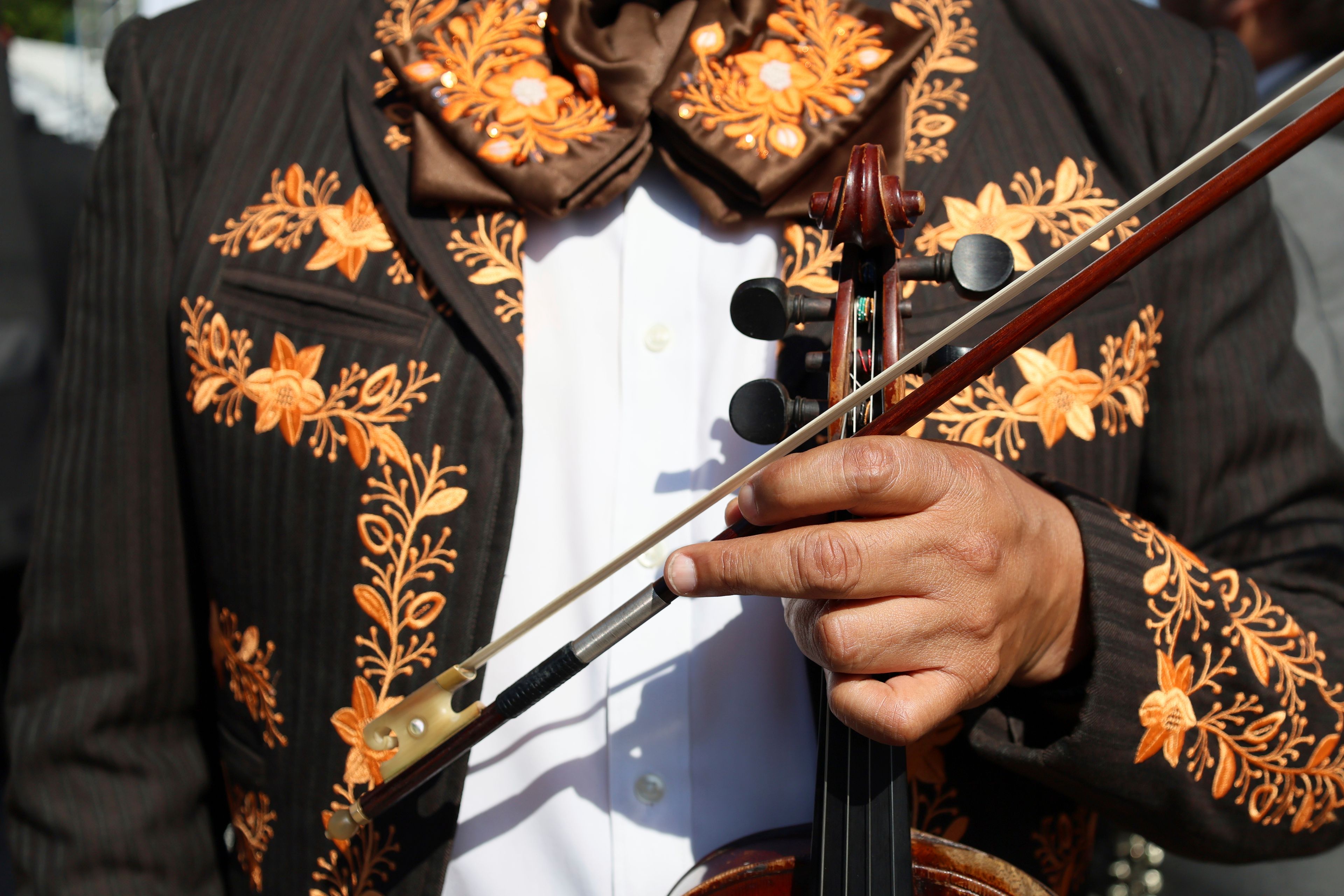 Musicians gather to break the record of most mariachis performing in unison, at the Zocalo, Mexico City's main square, Sunday, Nov. 10, 2024. (AP Photo/Ginnette Riquelme)