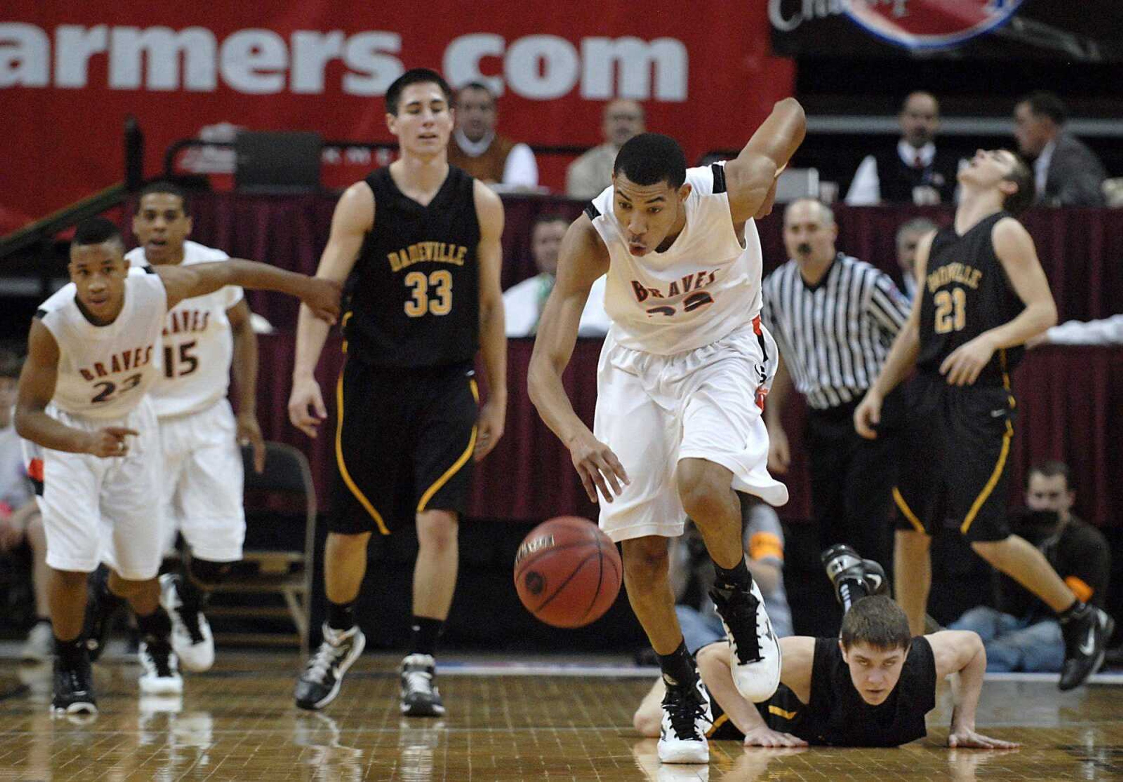 Scott County Central's Otto Porter takes off up the court during the fourth quarter of the Class 1 championship game against Dadeville on Saturday in Columbia, Mo. (Kristin Eberts)