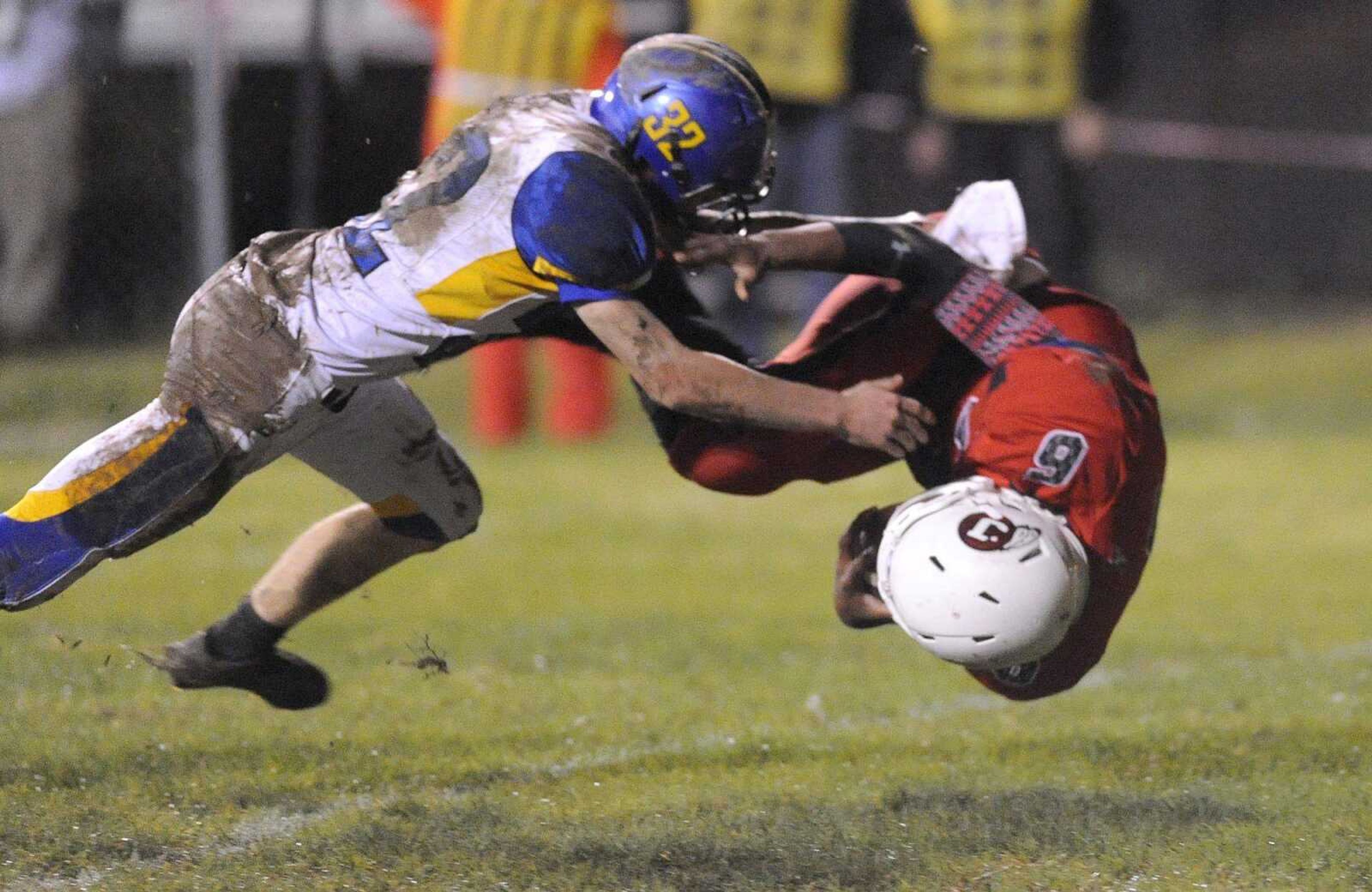 Jackson's quarterback Dante Vandeven leaps into the end zone for a touchdown in the second quarter against Seckman Friday, Oct. 10, 2014 in Jackson. (GLENN LANDBERG)