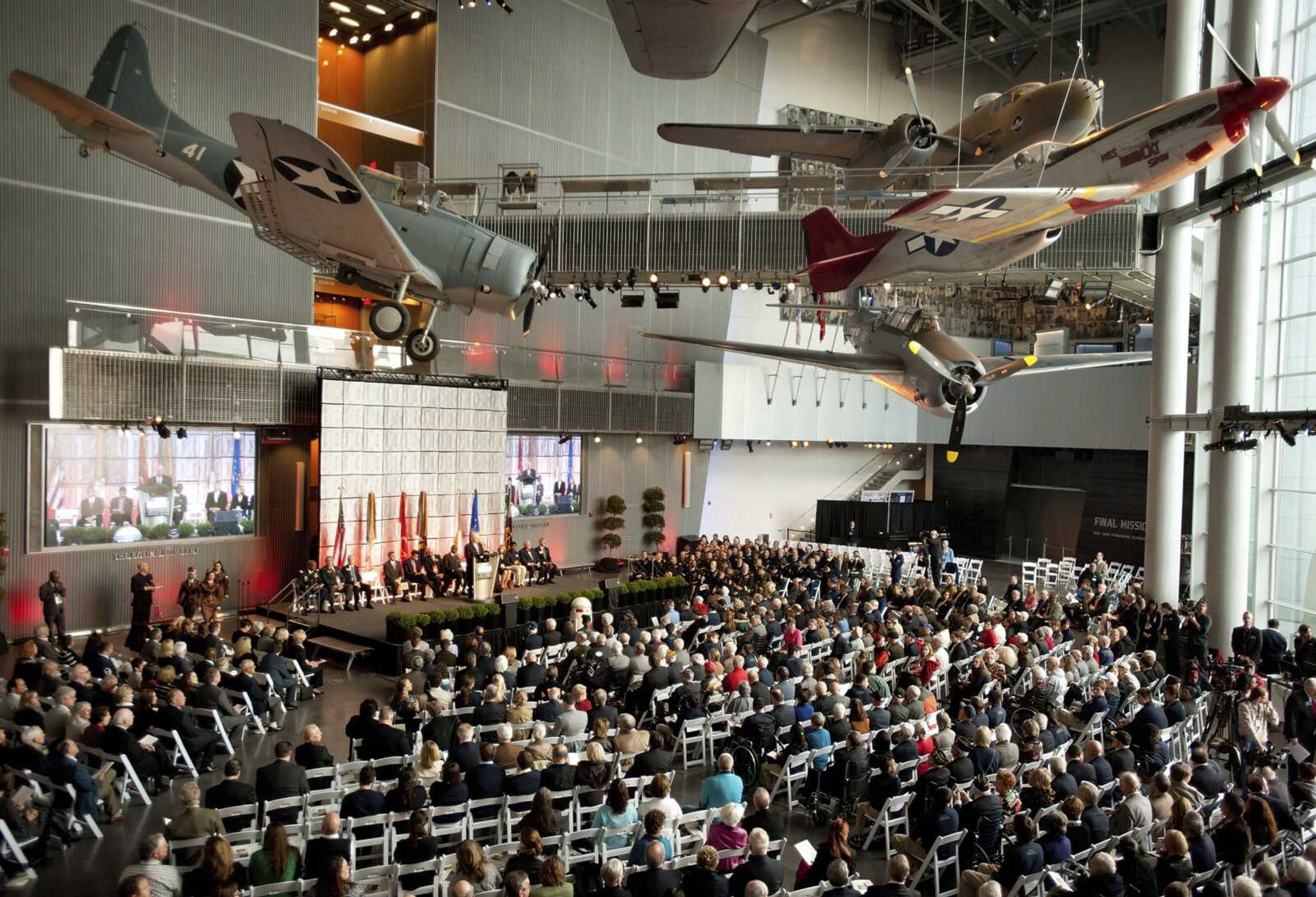 Visitors attending the 2014 opening of The National World War II Museum's exhibit, titled "The Road to Berlin," at the Boeing Freedom Pavilion in New Orleans. Executives at the National World War II Museum say creating a vast online collection of 9,000 existing oral and written histories will take longer than the war was fought: 10 years and $11 million.