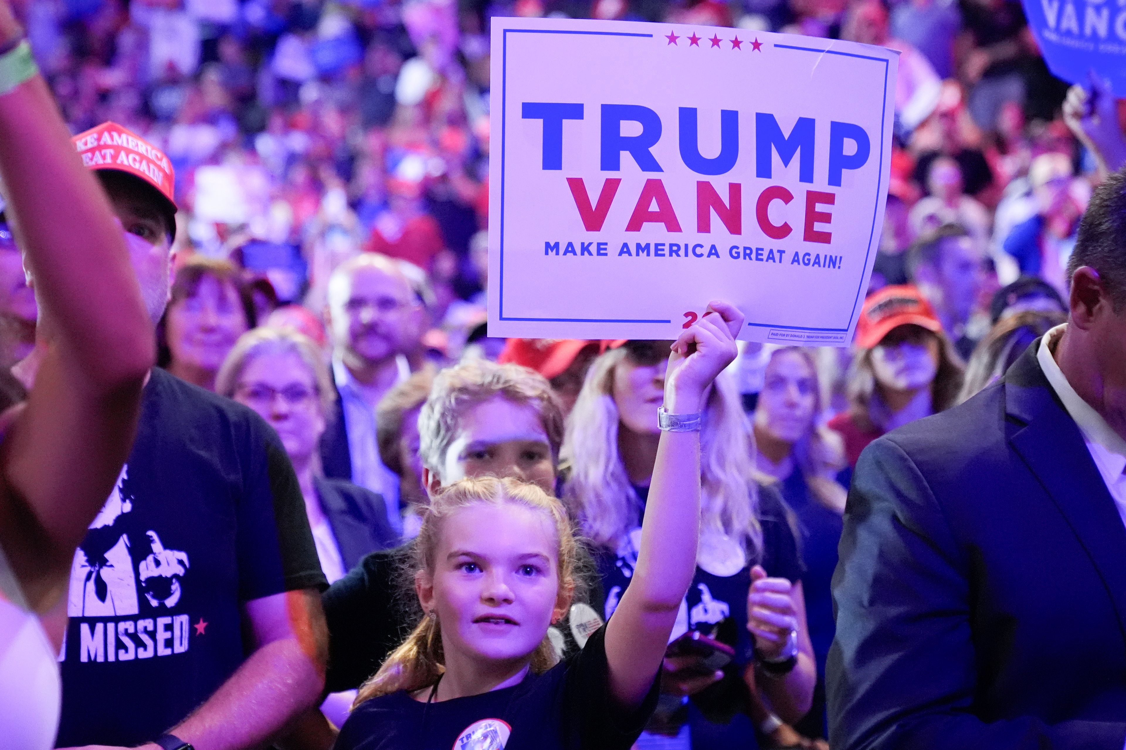 A young supporter of Republican presidential nominee former President Donald Trump, attends a campaign event at Nassau Coliseum, Wednesday, Sept.18, 2024, in Uniondale, N.Y. (AP Photo/Alex Brandon)