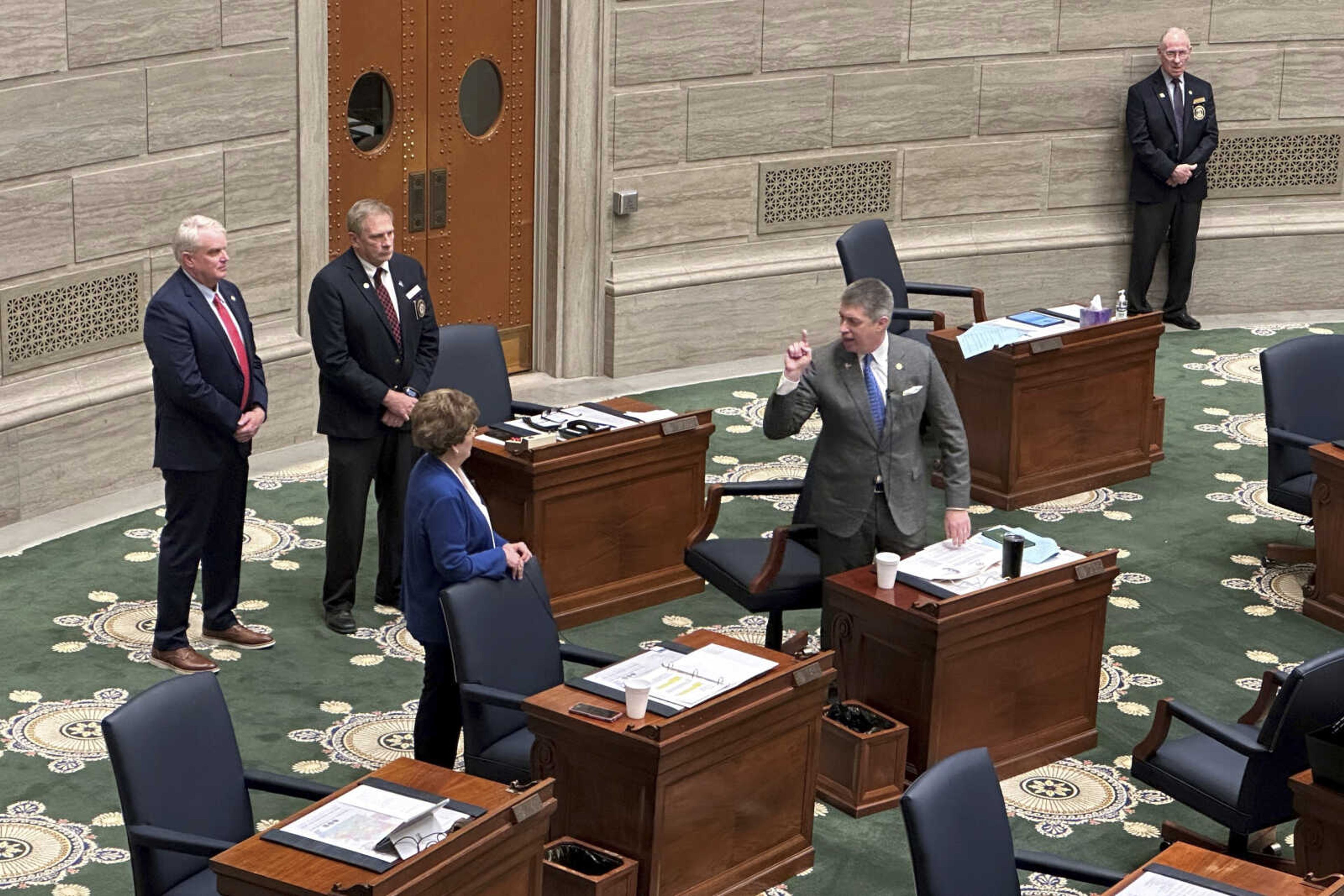 Republican state Sen. Bill Eigel, front right, points at Missouri Senate Majority Leader Cindy O'Laughlin during a testy exchange Thursday on the floor of the Senate in Jefferson City. O'Laughlin said she would like to expel Eigel from the Senate because of his obstruction of the chamber's work. Eigel is an outspoken member of the newly formed Freedom Caucus.