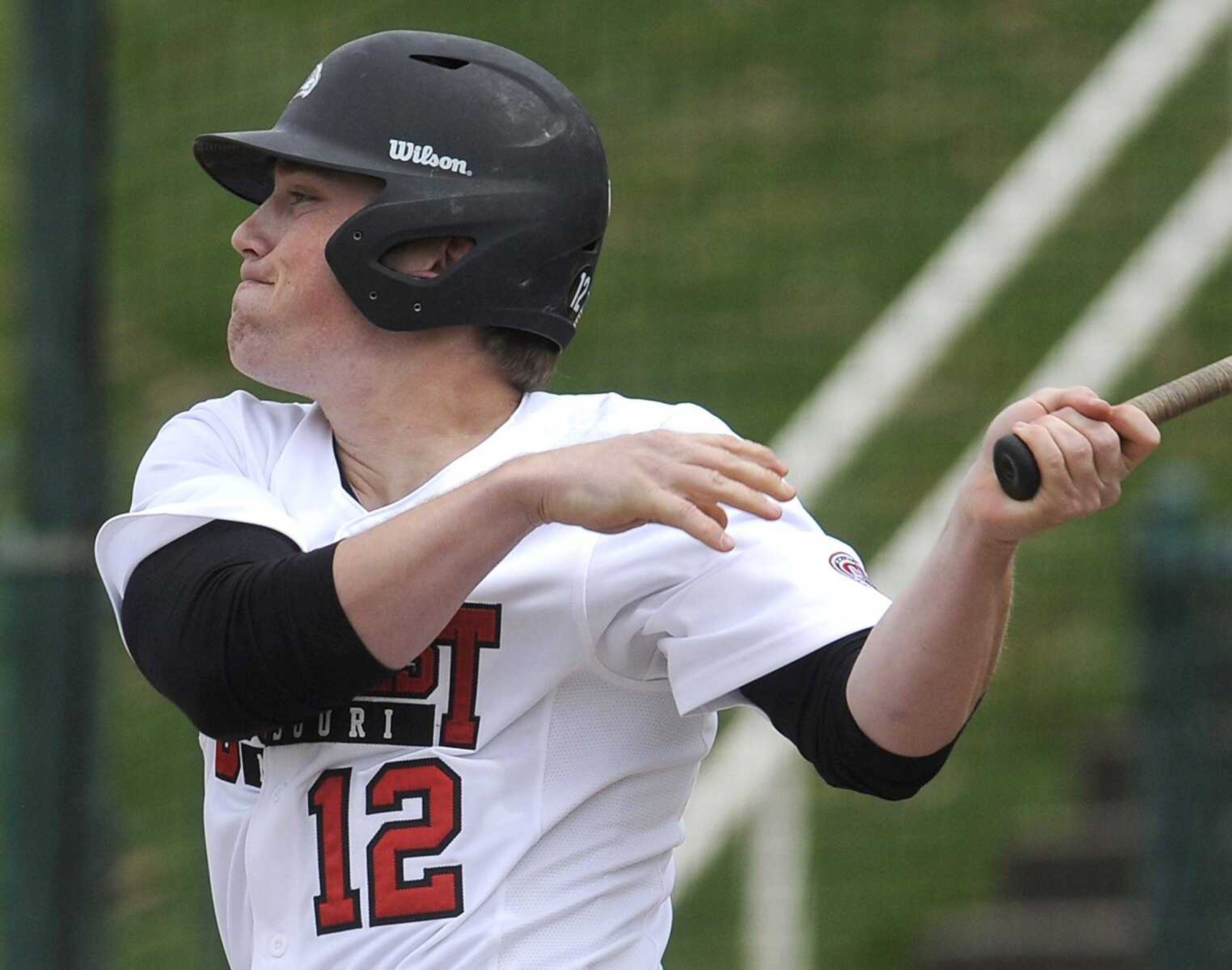 Southeast Missouri State's Trevor Ezell hits a solo home run against Austin Peay during the first inning Sunday at Capaha Field. (Fred Lynch)