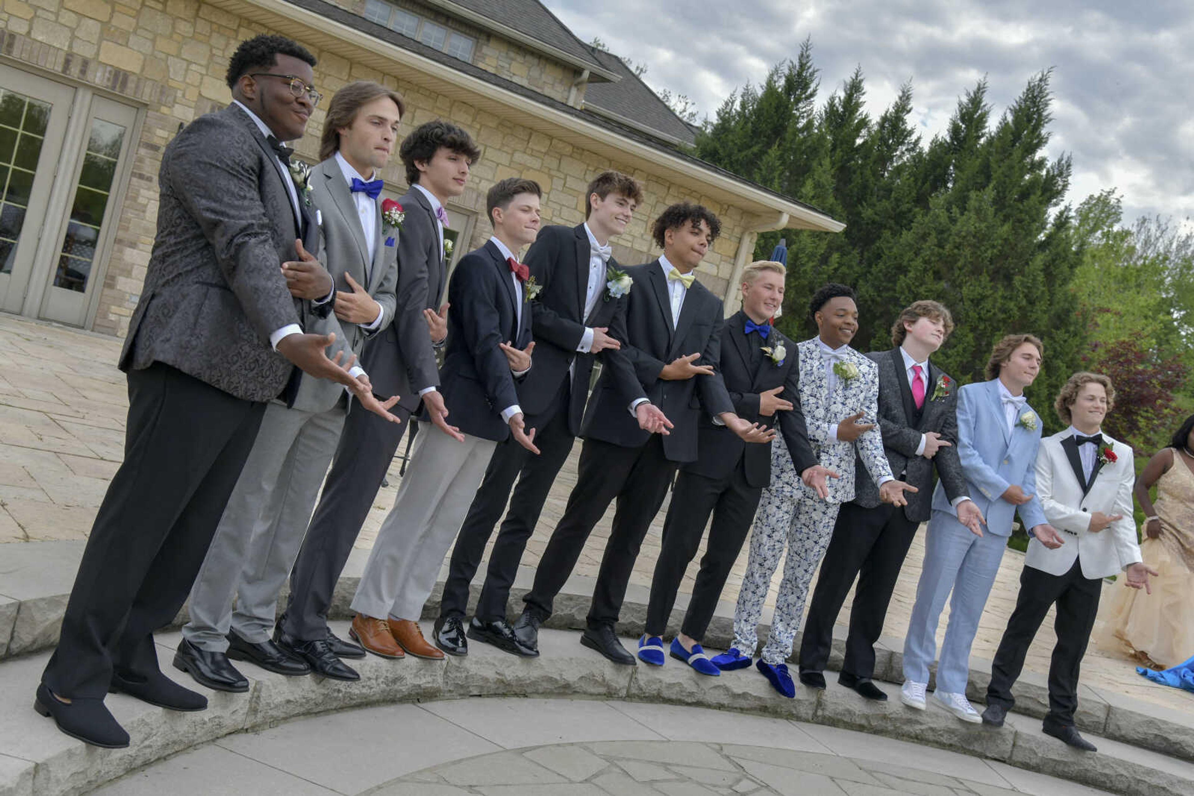 Students do a pose made popular from Tik-Tok during a pre-prom event at the Dalhousie Golf Club in Cape Girardeau on Saturday, May 8, 2021.