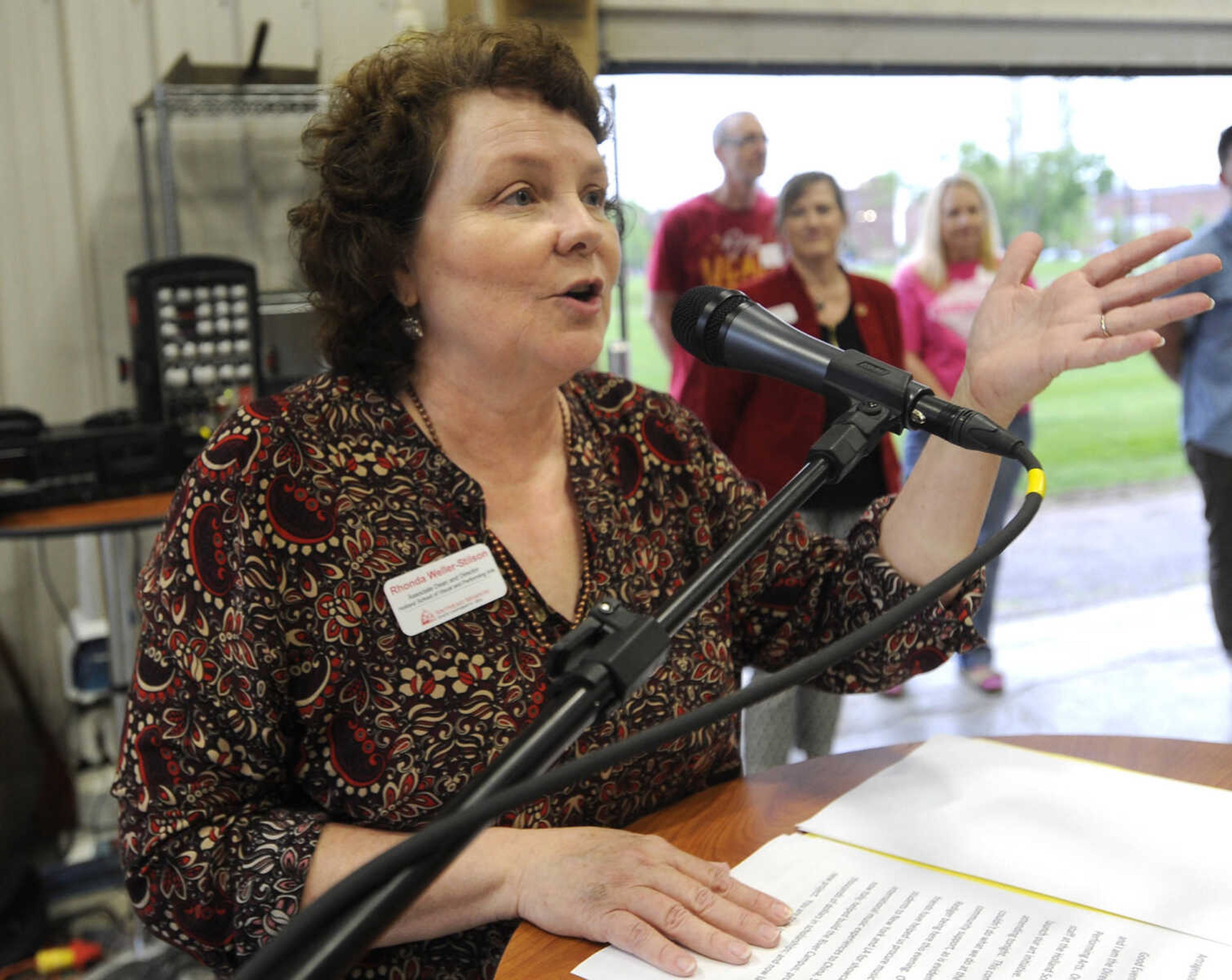 FRED LYNCH ~ flynch@semissourian.com
Rhonda Weller-Stilson, director of the Holland School of Visual and Performing Arts at the River Campus, welcomes patrons Thursday, April 20, 2017 during ARTrageous at Erlbacher Gear and Machine Works in Cape Girardeau.