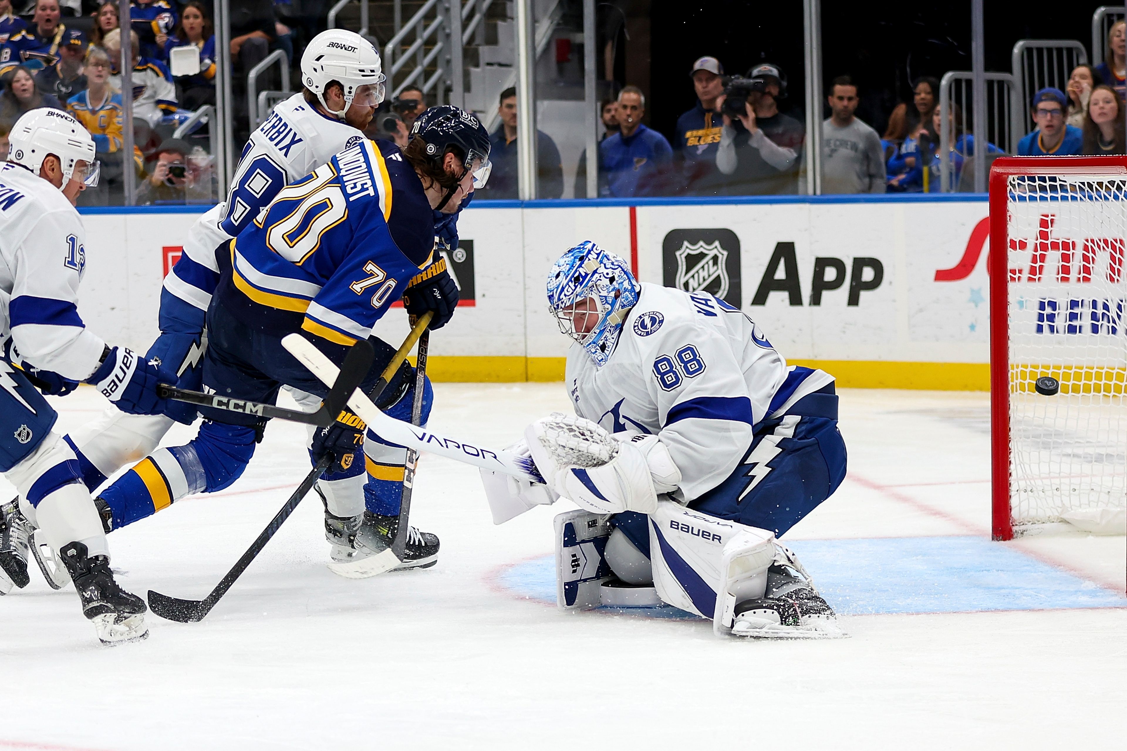 St. Louis Blues' Oskar Sundqvist (70) scores past Tampa Bay Lightning goaltender Andrei Vasilevskiy (88) during the second period of an NHL hockey game Tuesday, Nov. 5, 2024, in St. Louis.