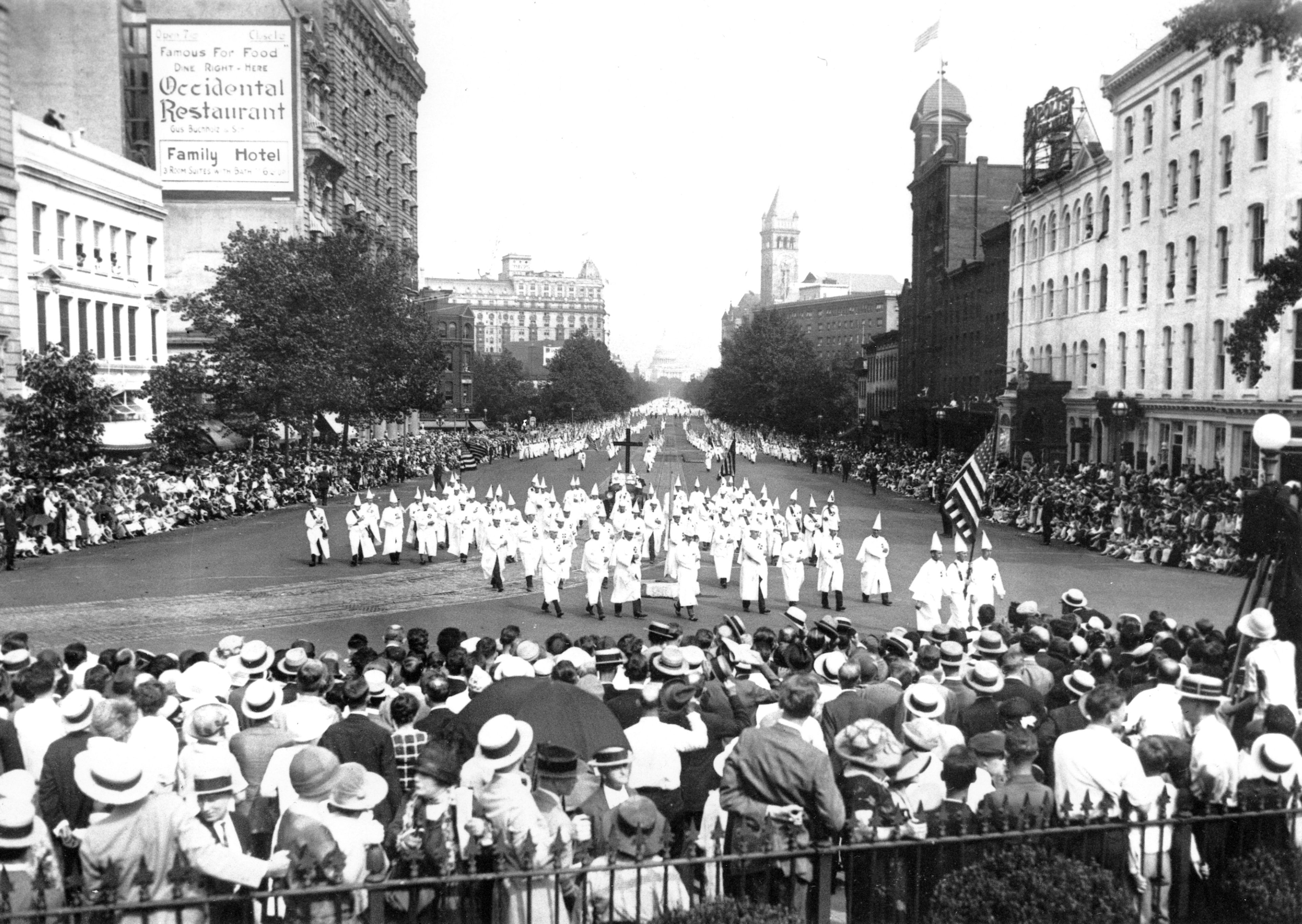 FILE - The Ku Klux Klan marches down Pennsylvania Ave. past the Treasury Building in Washington D.C. in 1925. (AP Photo, File)