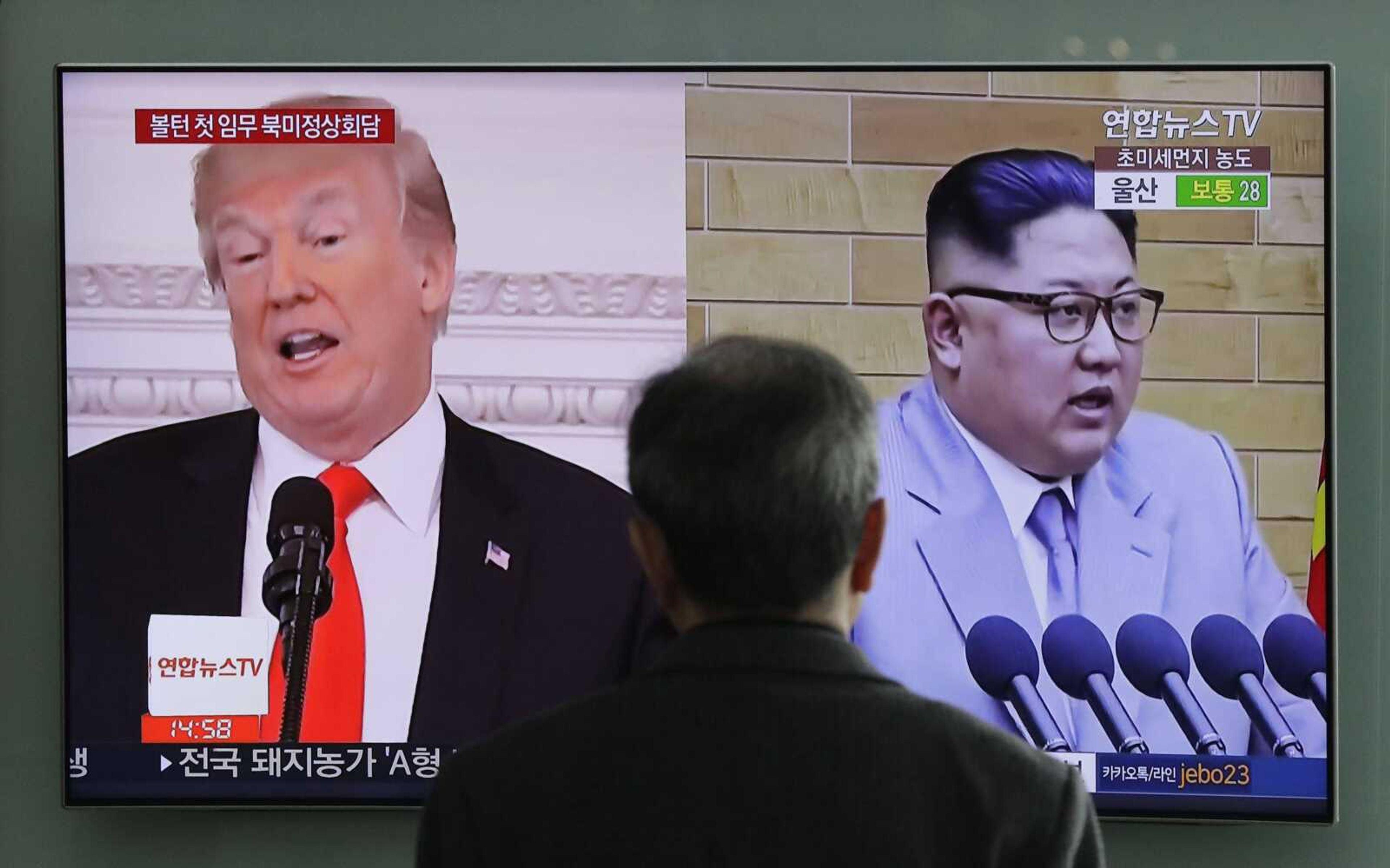 A man watches a TV screen showing file footage of U.S. President Donald Trump, left, and North Korean leader Kim Jong Un during a news program at the Seoul Railway Station in Seoul, South Korea. Increased activity at a North Korean nuclear site has once again caught the attention of analysts and renewed concerns about the complexities of denuclearization talks as President Donald Trump prepares for a summit with Kim Jong Un.