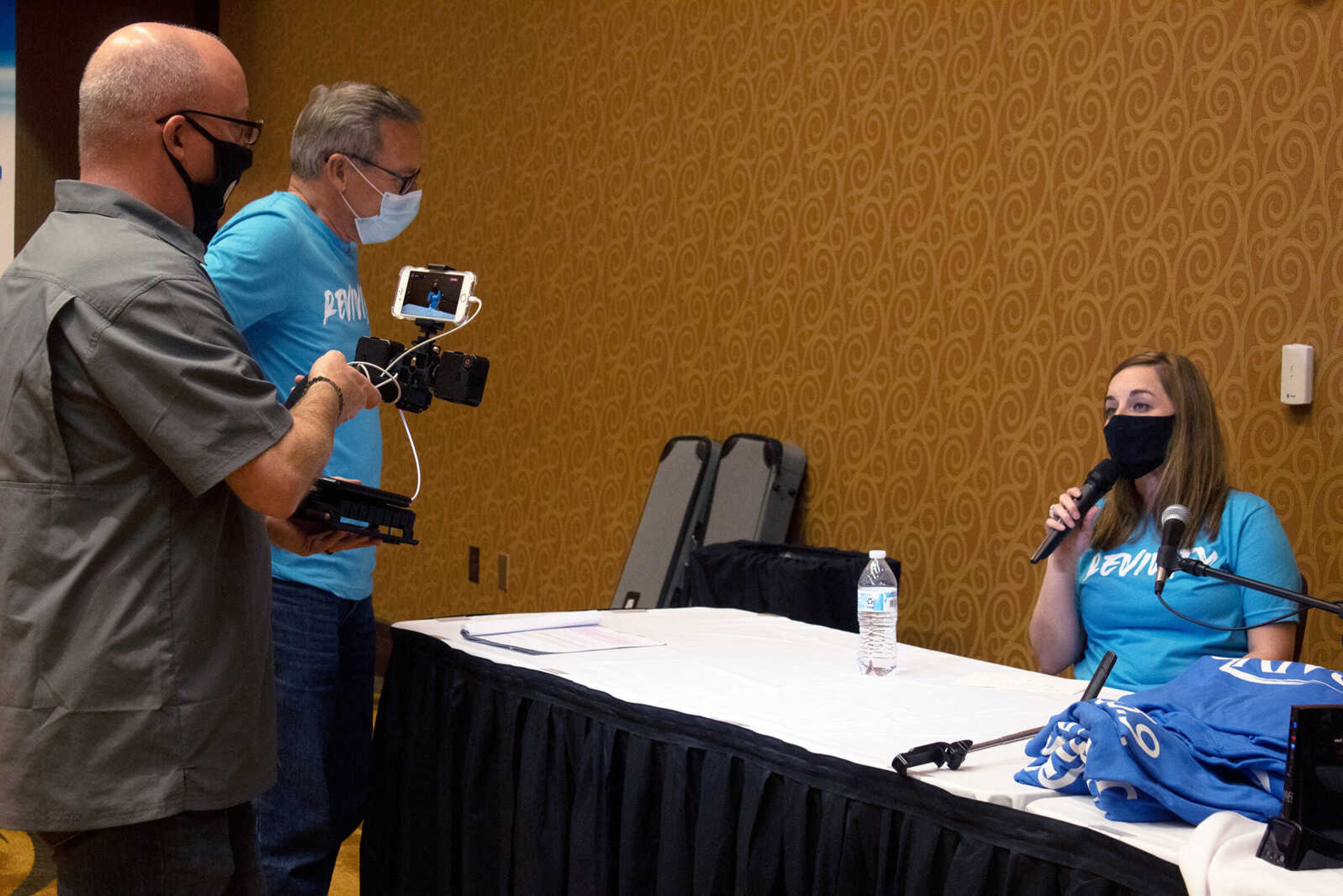 Greg Vaughn (left) from MediaLeaf films Executive Director of Old Town Cape Liz Haynes for the livestream of Old Town Cape's Revivify fundraiser on Thursday, Oct. 22, 2020, at Century Casino in Cape Girardeau.