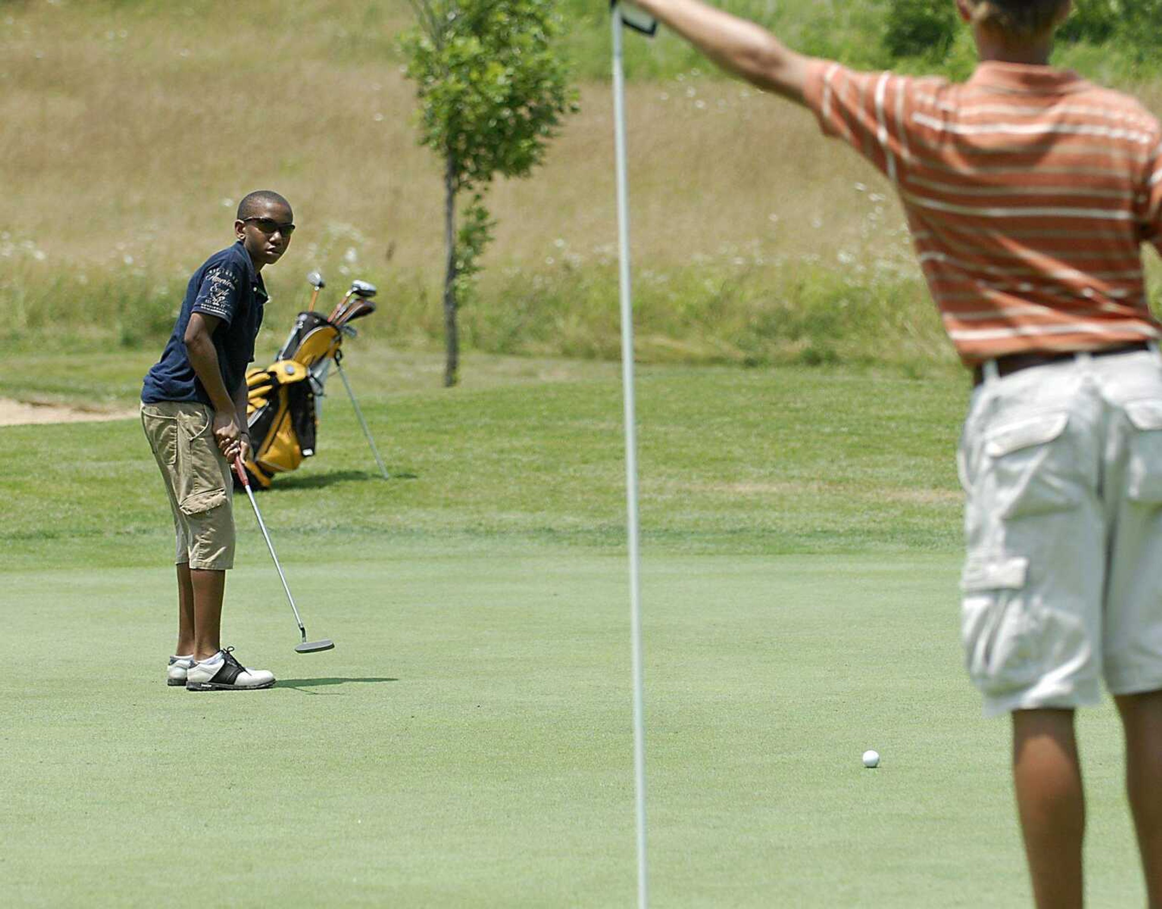 KIT DOYLE ~ kdoyle@semissourian.com
Aron Jefferson, of Poplar Bluff, waited for his putt to break toward the hole Wednesday, June 25, 2008, during the PGA Gateway Junior Series tournament at Bent Creek in Jackson.