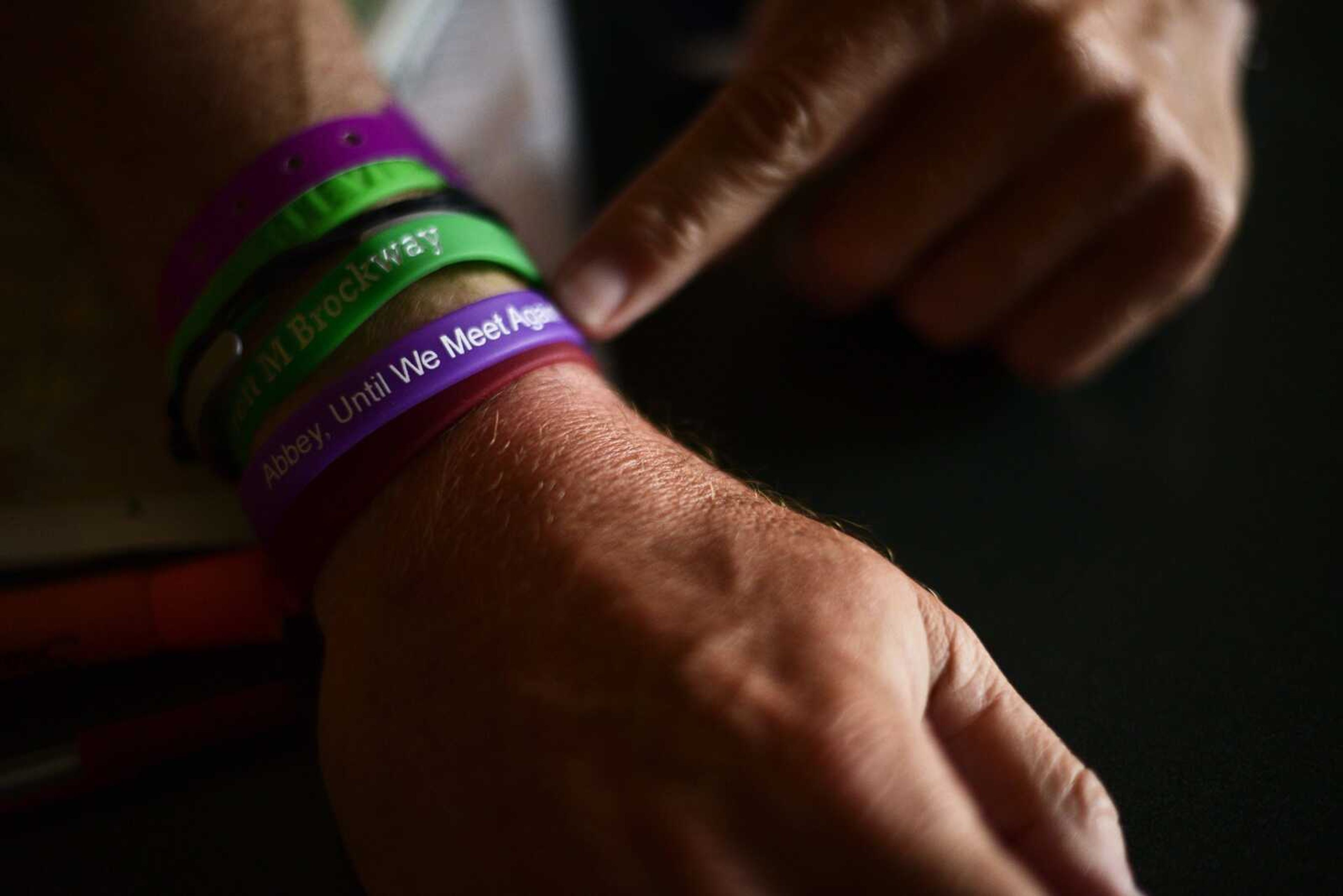 Bill Conner shows off bracelets he has received from people in support for his journey for organ-donor awareness.