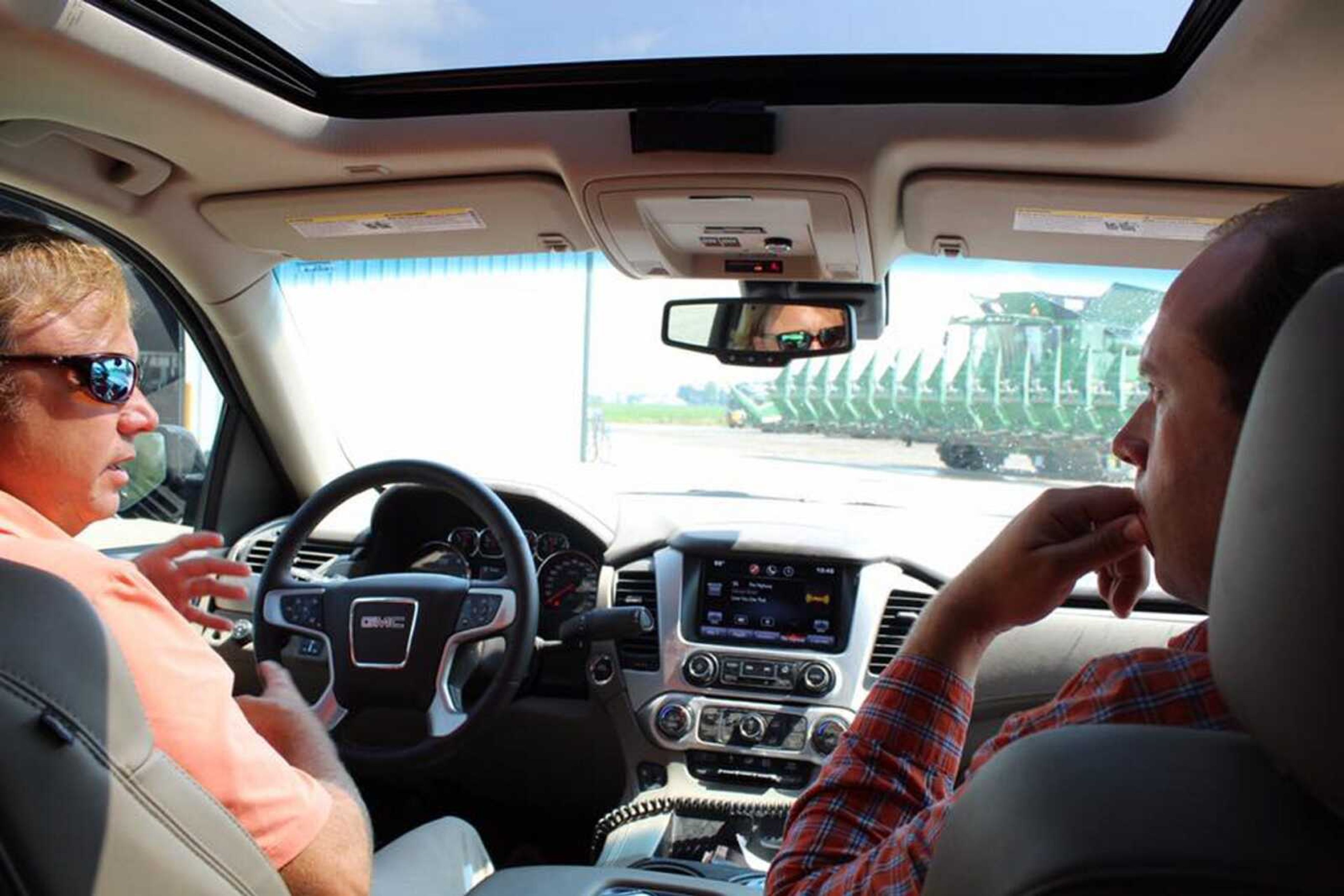 Donny DeLine, left, is seen in a vehicle speaking with Congressman Jason Smith, representative of Missouri's 8th district, in this photo posted to Smith's Facebook page July 26, 2016. In the post, Smith called DeLine Farms "a great example of the incredible efficiency of today's farmers. They operate in six states and run the most advanced machinery, including this 16-row header combine that they let me check out today."