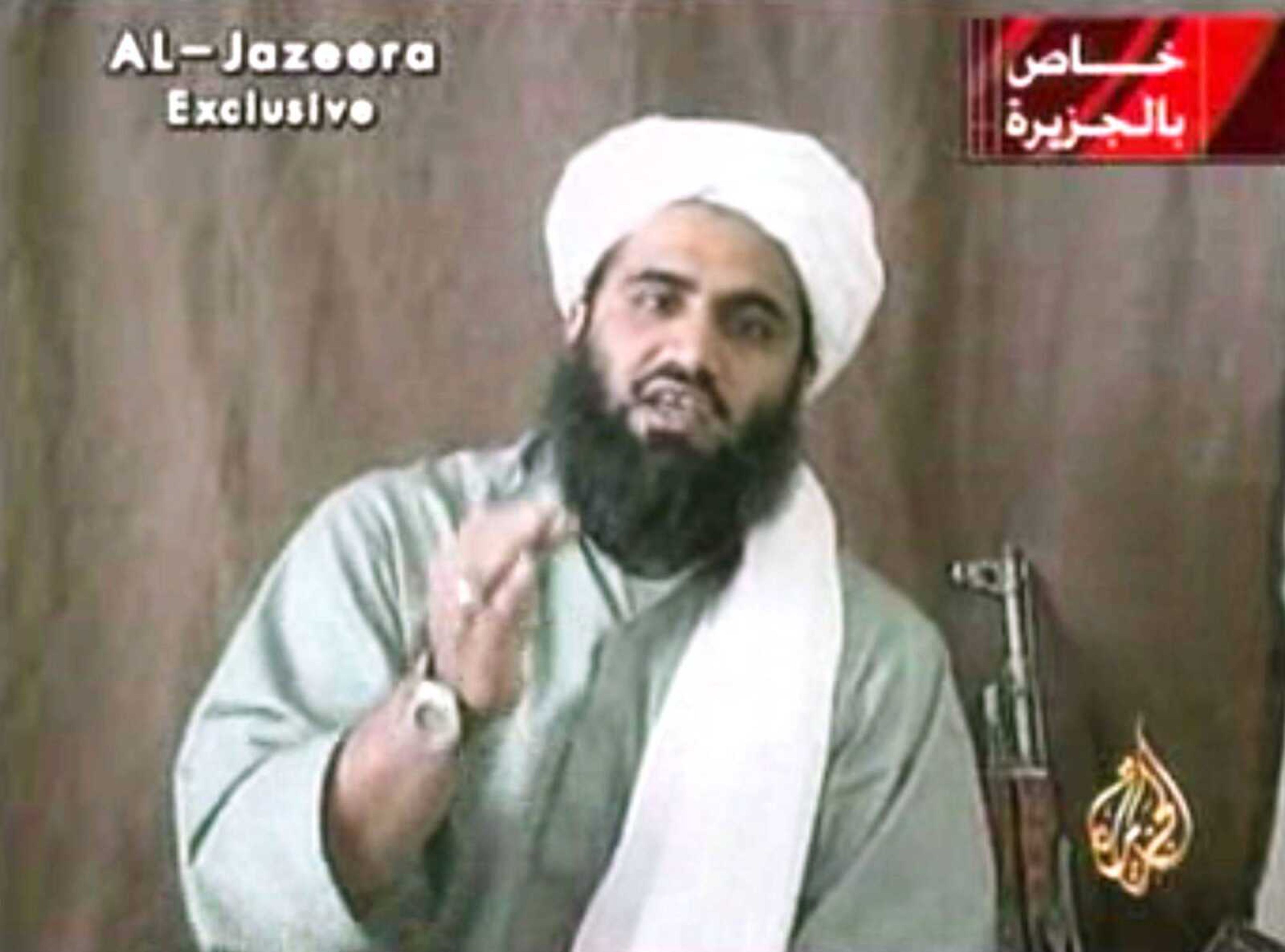 Sulaiman Abu Ghaith, Osama bin Laden&#8217;s son-in-law and spokesman, is seen in an image made from a video. (Al-Jazeera file)