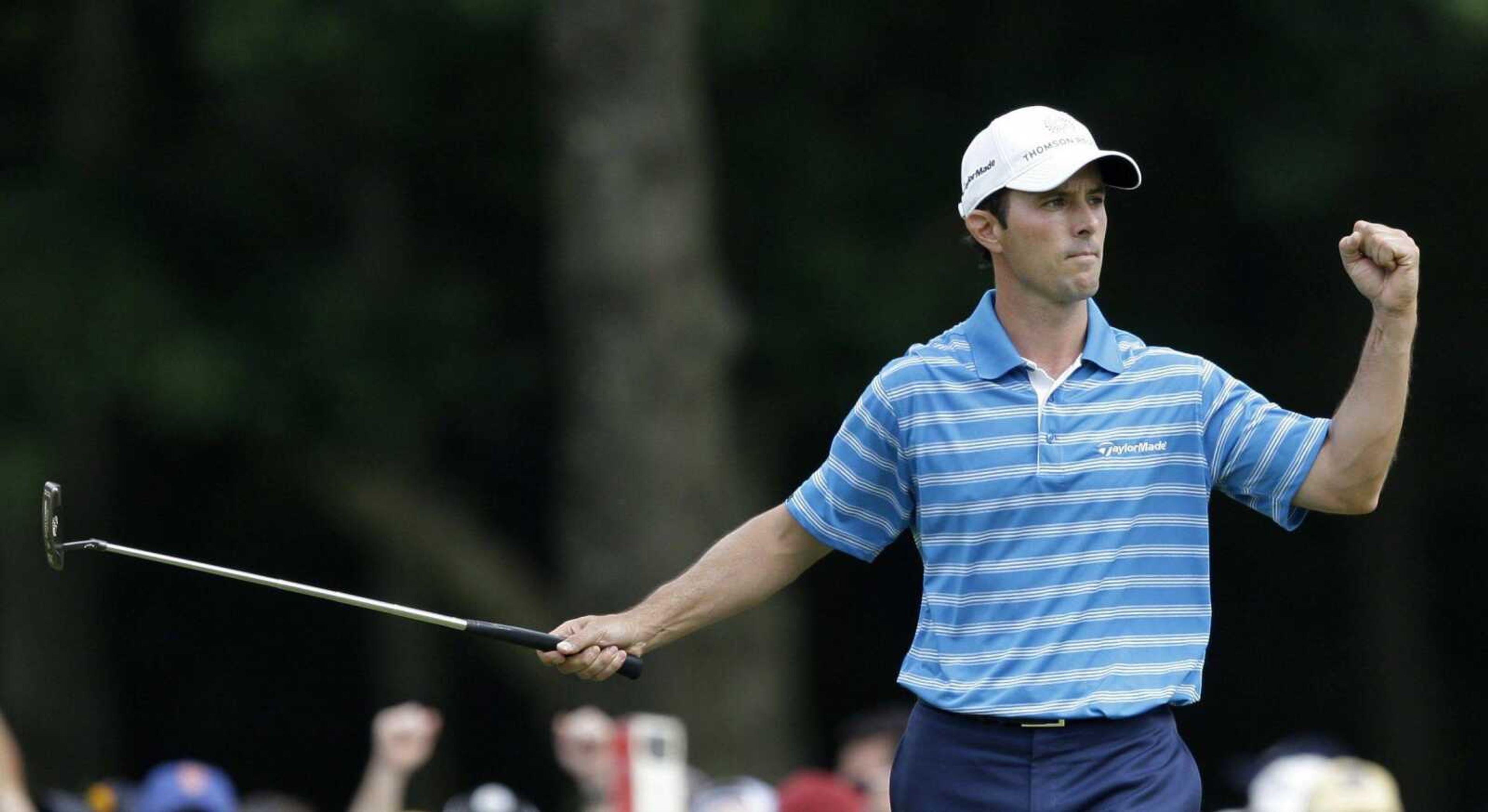 Mike Weir of Canada celebrates a birdie on the ninth hole Friday during the first round of the U.S. Open at Bethpage State Park's Black Course in Farmingdale, N.Y., Weir was the leader after the first round with 6-under 64. (Charles Krupa ~ Associated Press)