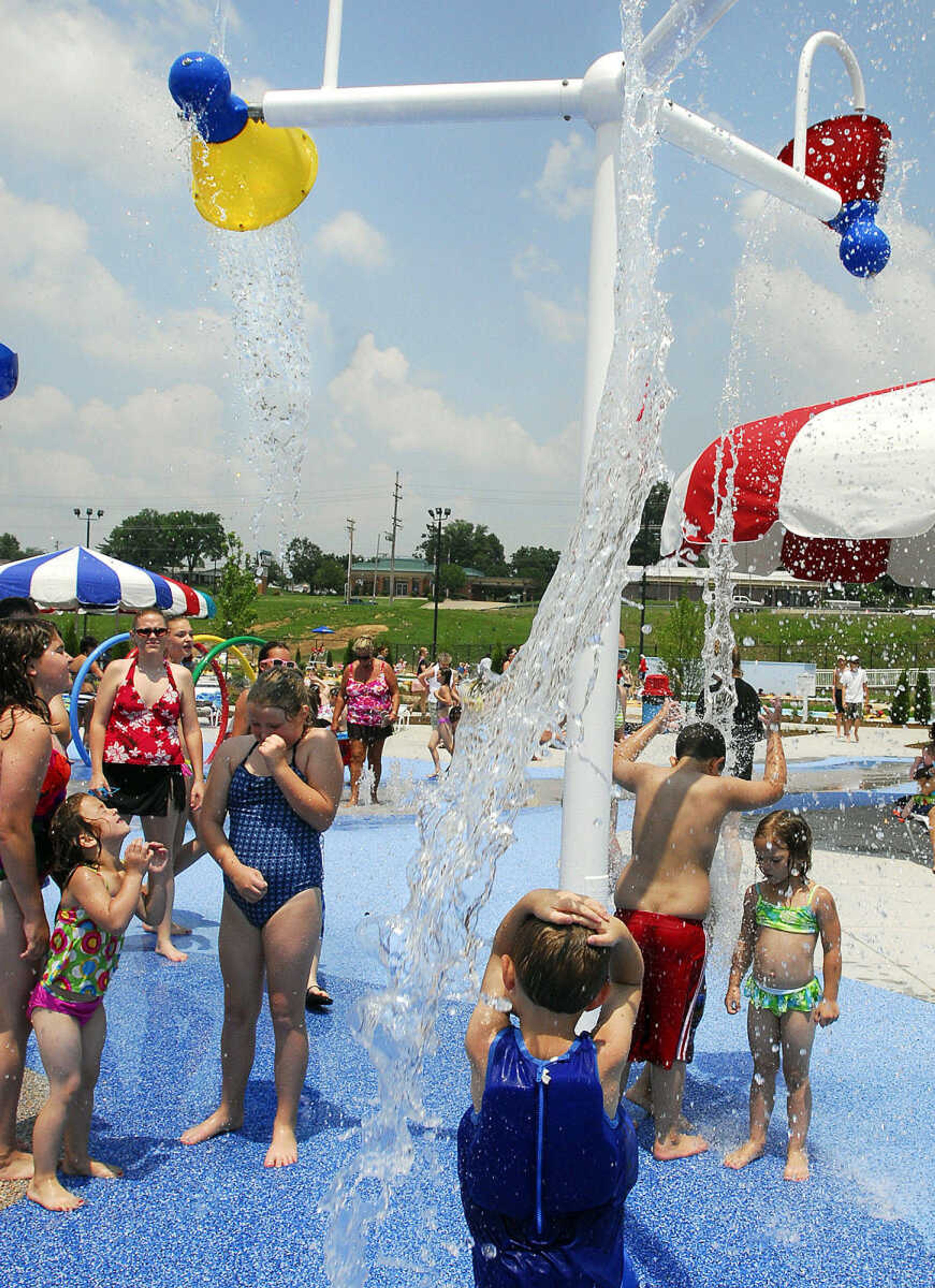 LAURA SIMON~lsimon@semissourian.com
Children prepare to be soaked on the splash pad area Saturday, May 29, 2010 during the opening day of Cape Splash Family Auquatic Center.