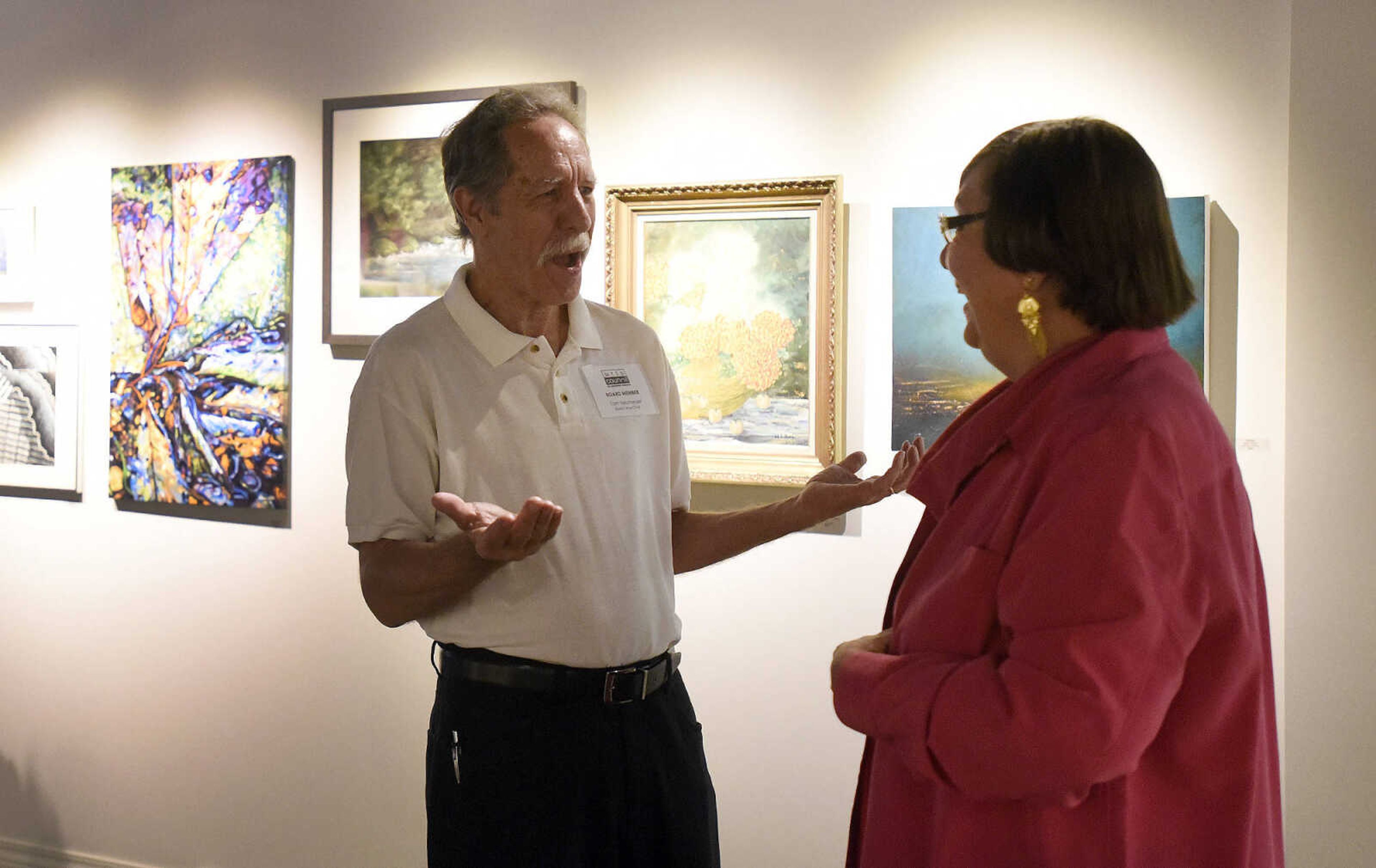 LAURA SIMON ~ lsimon@semissourian.com

Tom Neumeyer and Ann Gifford visit during the grand opening reception for the 4th annual Members Exhibit at the Arts Council of Southeast Missouri in its new location at 16 North Spanish Street in downtown Cape Girardeau on Friday, Sept. 2, 2016.