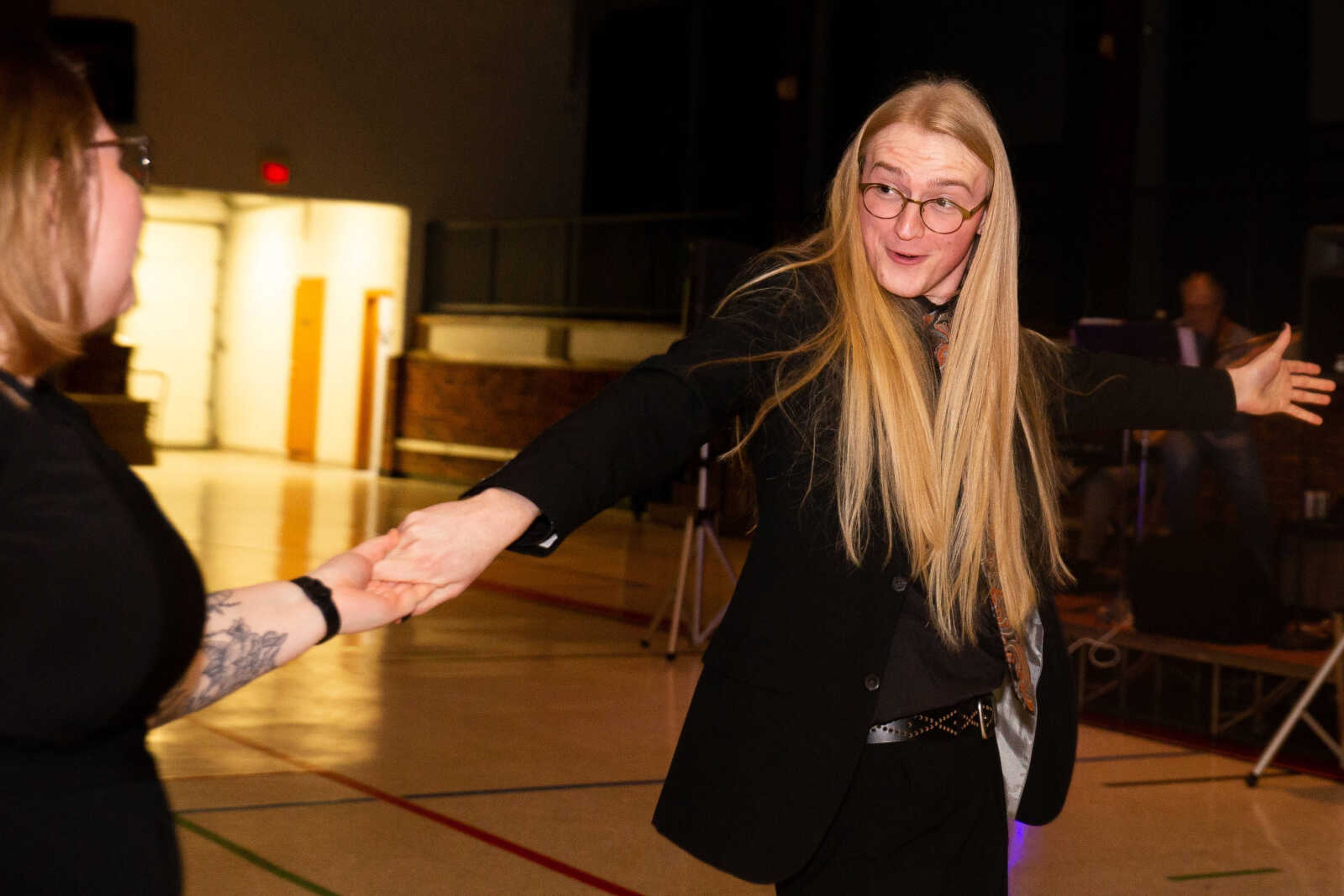 Sarah Russell and Bennett Turner dance together.