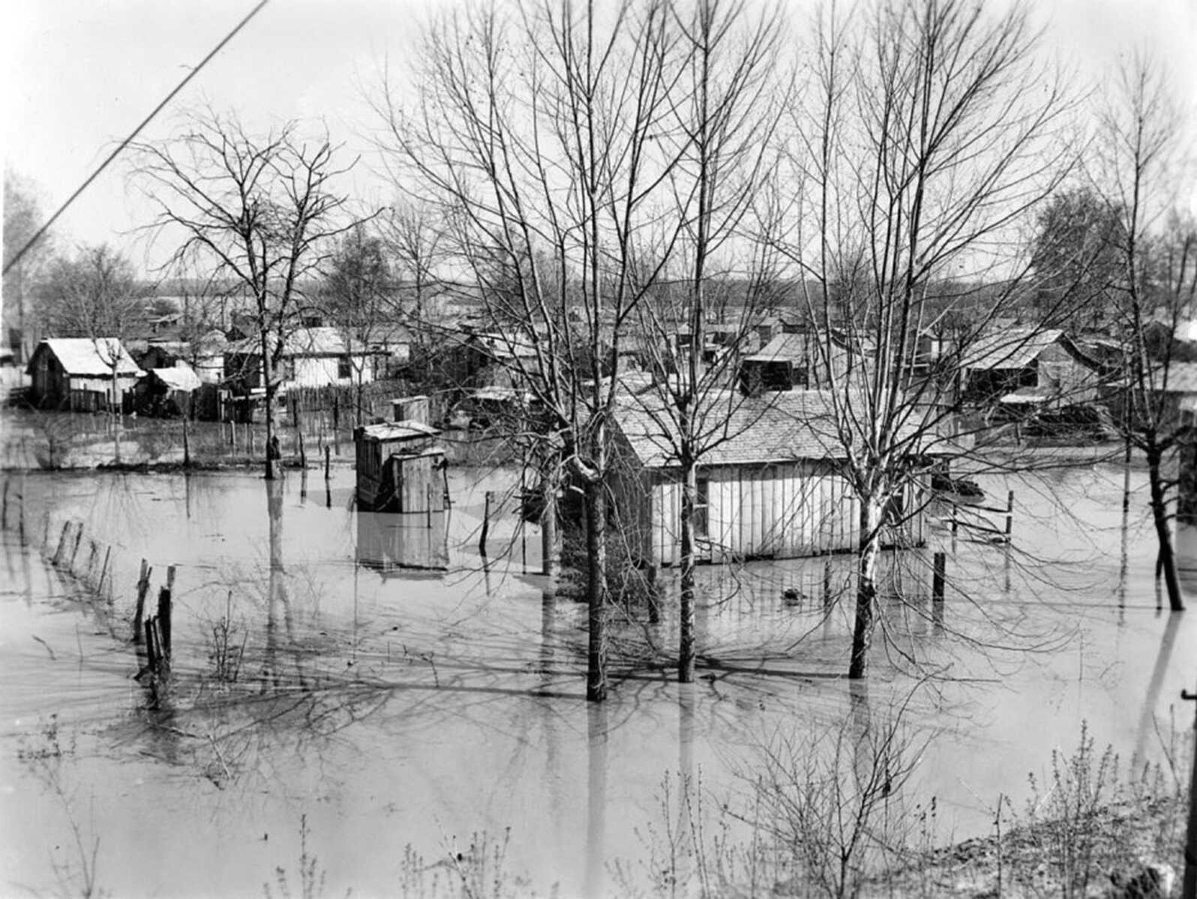 Periodic Mississippi River floods inundated Smelterville. Ramshackle homes, sheds and outhouses were common in this poor section of Cape Girardeau. This photo was taken circa April 1939.