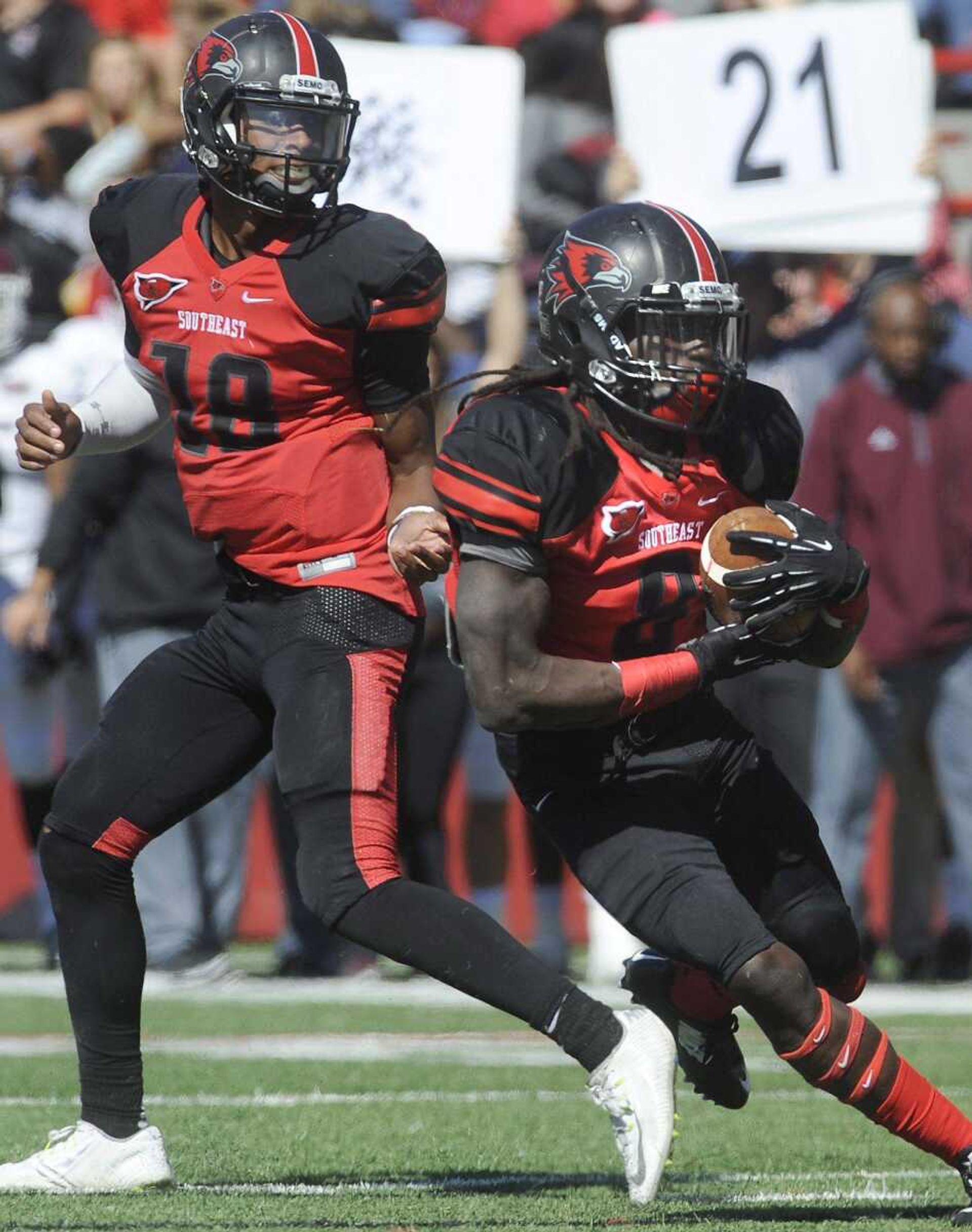 Southeast Missouri State's Tremane McCullough carries after a handoff from Dante Vandeven against Eastern Kentucky during the first quarter Saturday, Oct. 17, 2015 at Houck Stadium. (Fred Lynch)