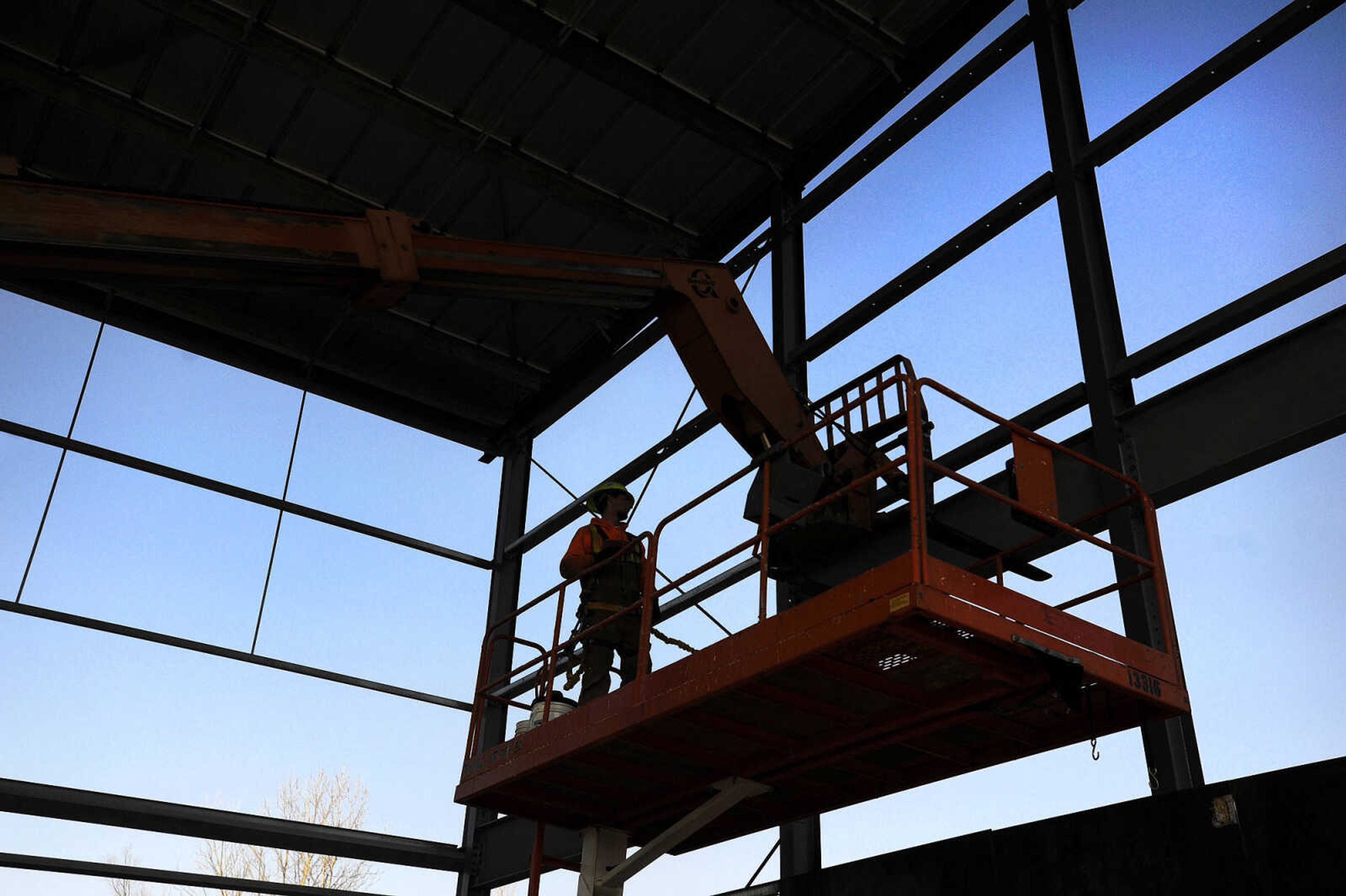 LAURA SIMON ~ lsimon@semissourian.com

A worker sets beams for the truck pit diverter at the City of Cape Girardeau's new transfer station, Wednesday, Jan. 27, 2016. Construction on the new $3.8 million station began in August, and is expected to open in April. The new station will replace the current transfer station that was built in the 1980s and the city has since outgrown it. With the revenue from the solid waste processed by the city from Republic's hauling operation as well as the lease payment for the city-owned facilities will provide enough revenue to pay for the new facility without increasing user fees.