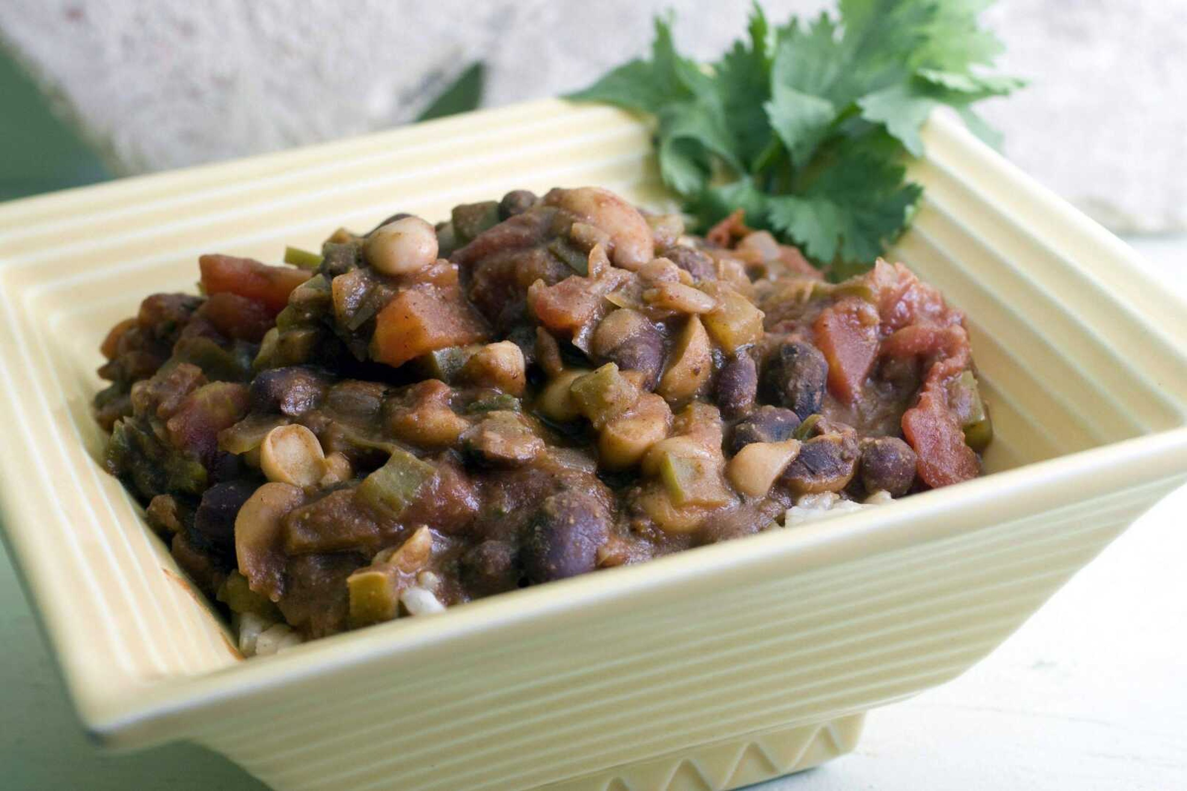 **FOR USE WITH AP LIFESTYLES** Mixed Bean Chili and Brown Rice is seen in this Sunday, Dec. 7, 2008 photo. Mixed Bean Chili and Brown Rice is not only a healthy meal, taking advantage of high fiber, low-fat beans, but is also economical while being filling. (AP Photo/Larry Crowe)