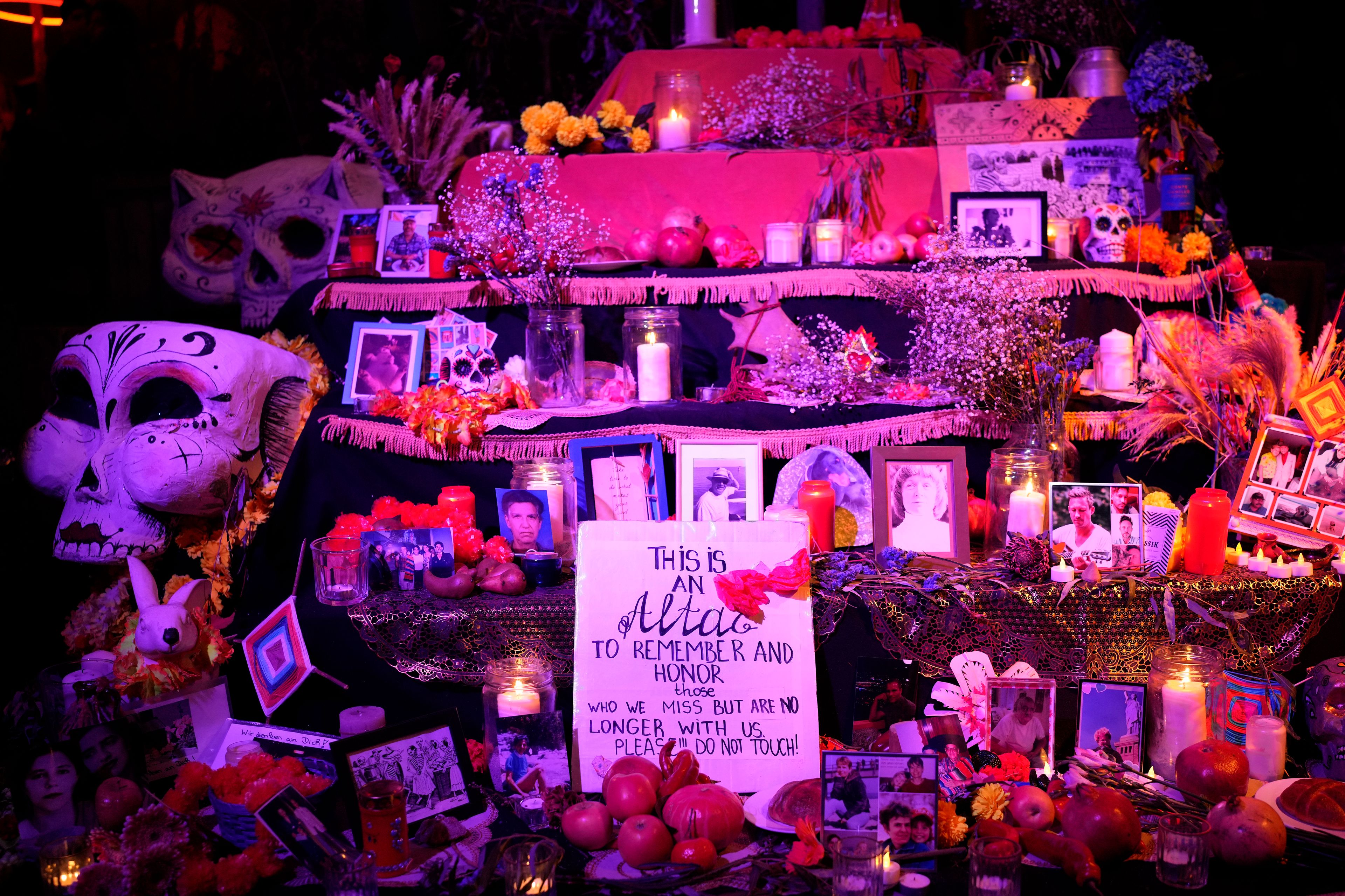 Latino community display offerings for the Day of the Dead in Berlin, Germany, Friday, Nov. 1, 2024. (AP Photo/Ebrahim Noroozi)