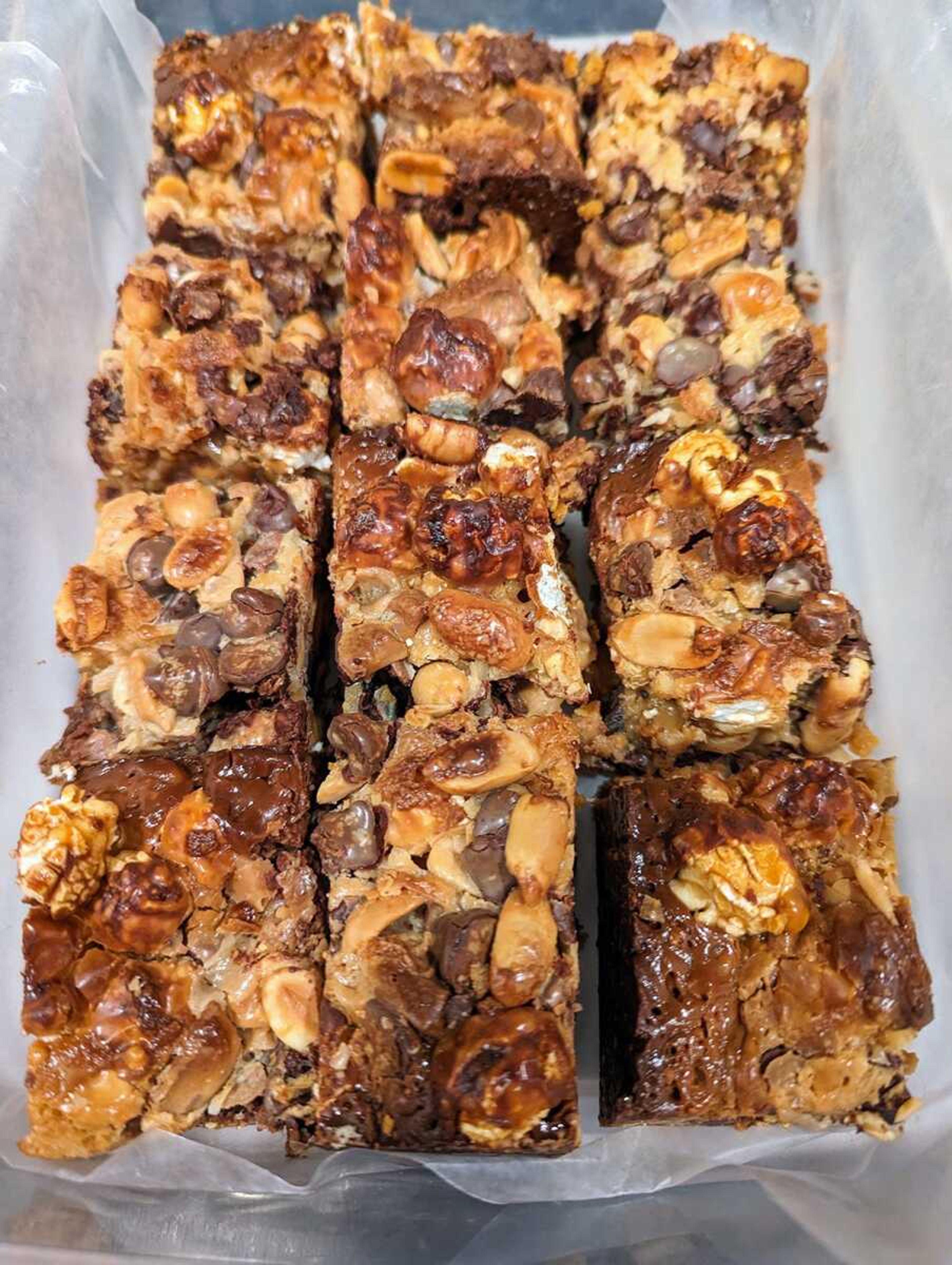 A batch of Showstopper Hello Dolly! Bars, which takes its name from the famous Carol Channing musical, fortified with double the usual ingredients, roasted white chocolate and caramel corn.