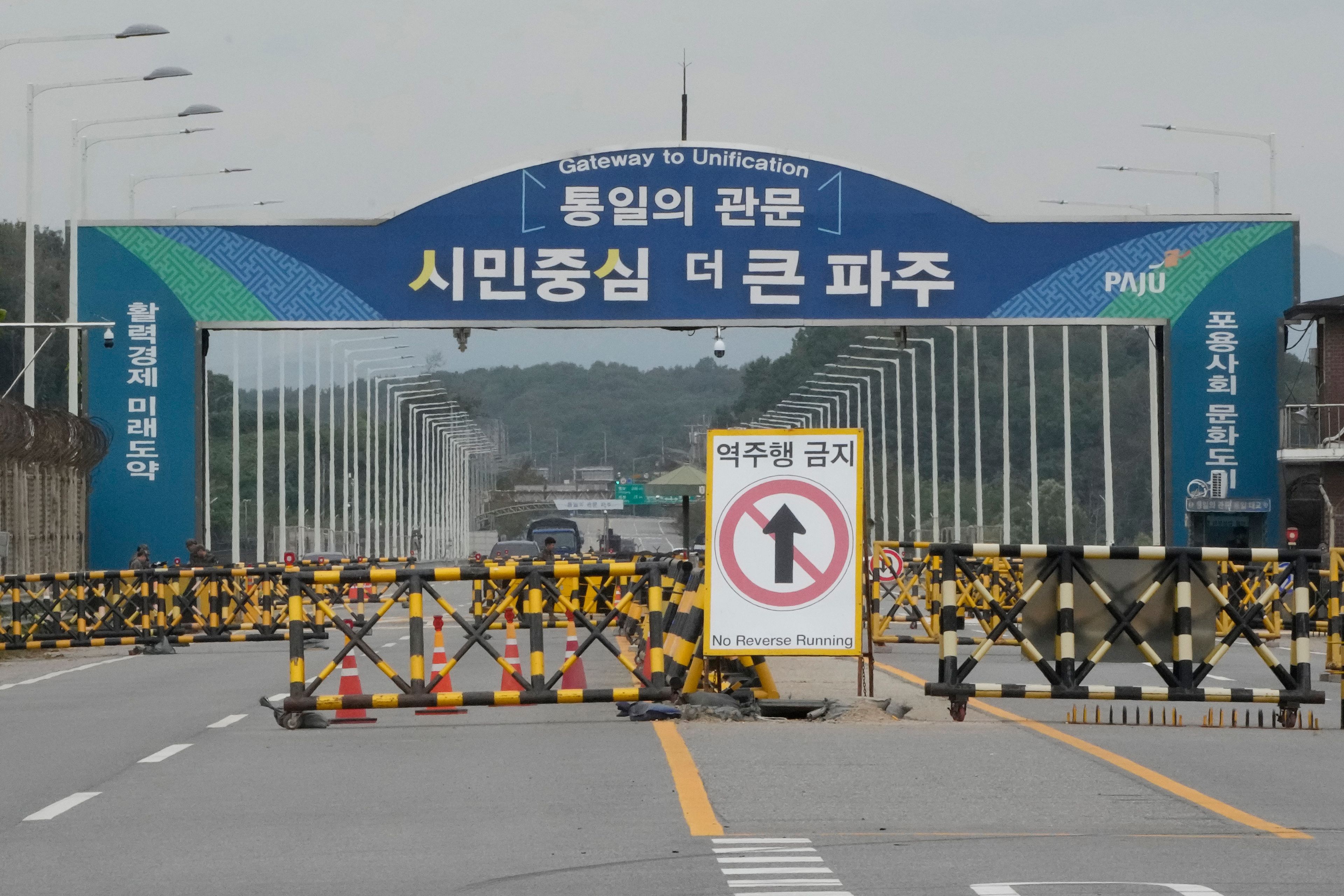 Barricades are placed near the Unification Bridge, which leads to the Panmunjom in the Demilitarized Zone in Paju, South Korea, Monday, Oct. 14, 2024. (AP Photo/Ahn Young-joon)