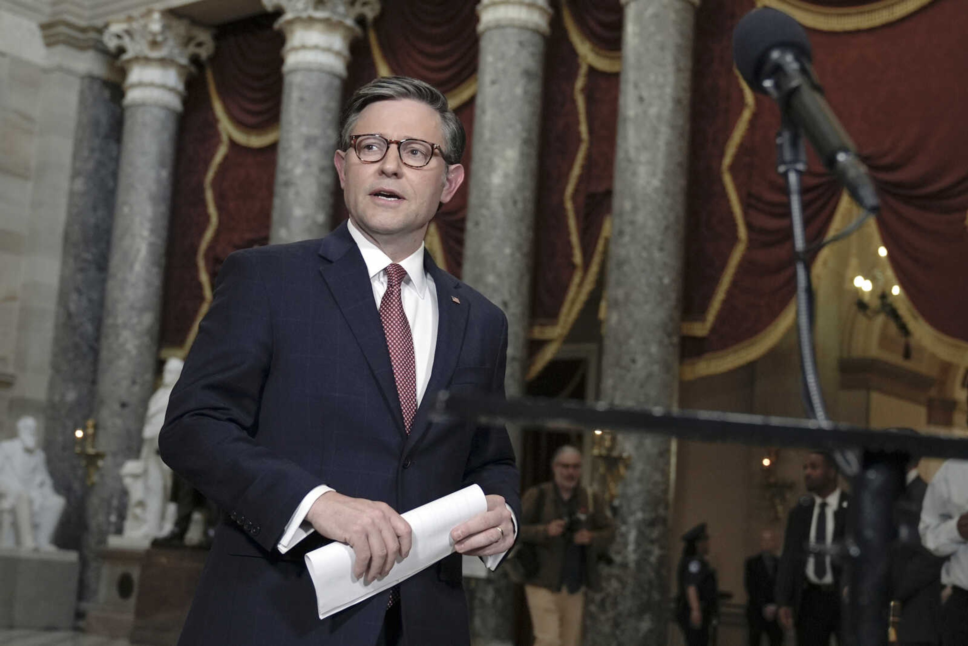 Speaker of the House Mike Johnson, R-La., arrives to discuss his proposal of sending crucial bipartisan support to aid Ukraine, Israel and Taiwan after weeks of inaction on Capitol Hill Wednesday, April 17, 2024, in Washington. (AP Photo/Mariam Zuhaib)