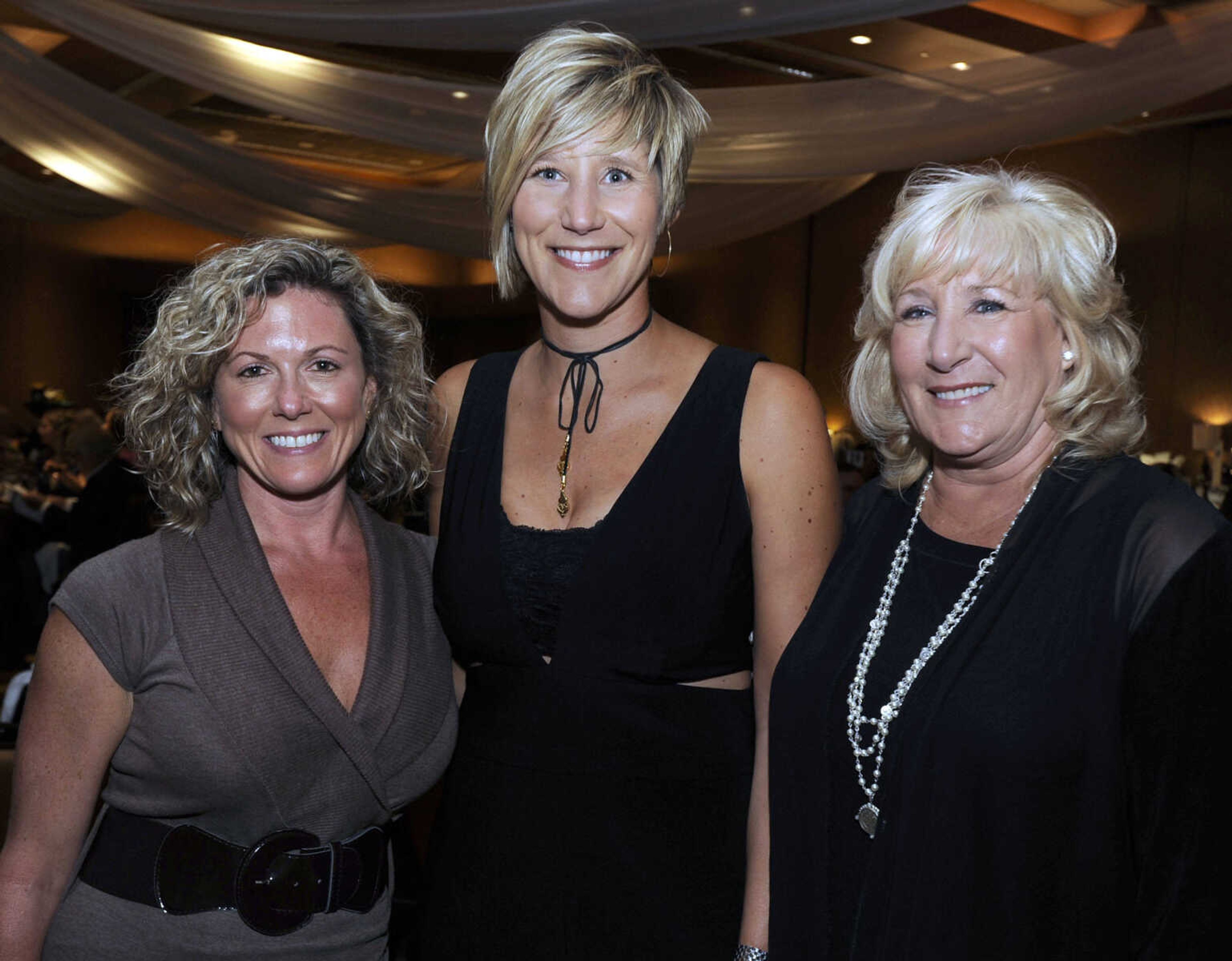 FRED LYNCH ~ flynch@semissourian.com
Tania Statler, left, Kendra Harris and Jayne Ervin pose for a photo Saturday, Sept. 9, 2017 at the Charles L. Hutson Auction benefiting Old Town Cape at Isle Casino Cape Girardeau Event Center.