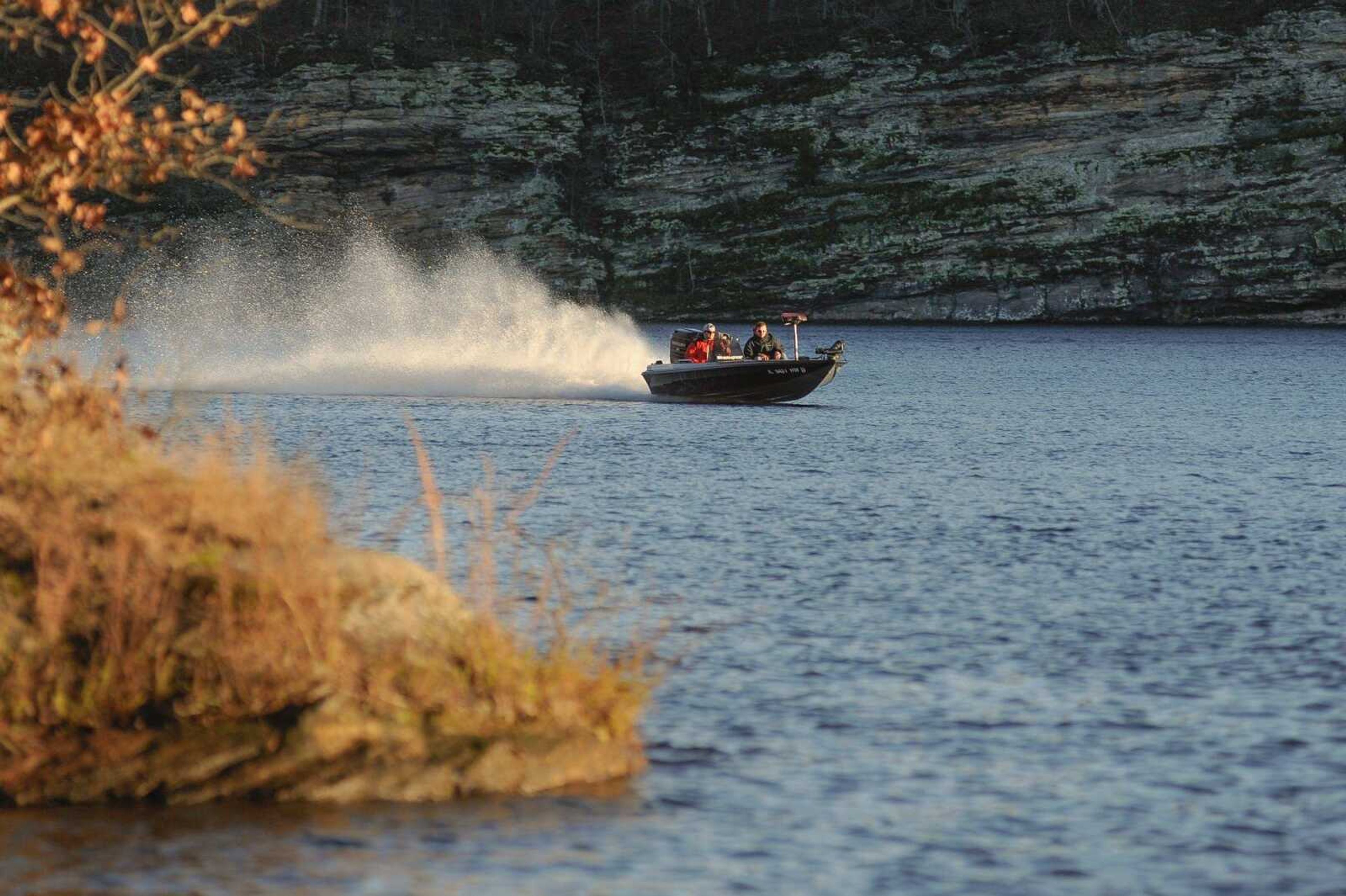 Luke Brozovich and Grant Hindon with the Southeast Missouri State Bass Anglers club head back to the boat launch after a day of fishing on Kinkaid Lake in Illinois Wednesday, Nov. 18, 2015. (Glenn Landberg)