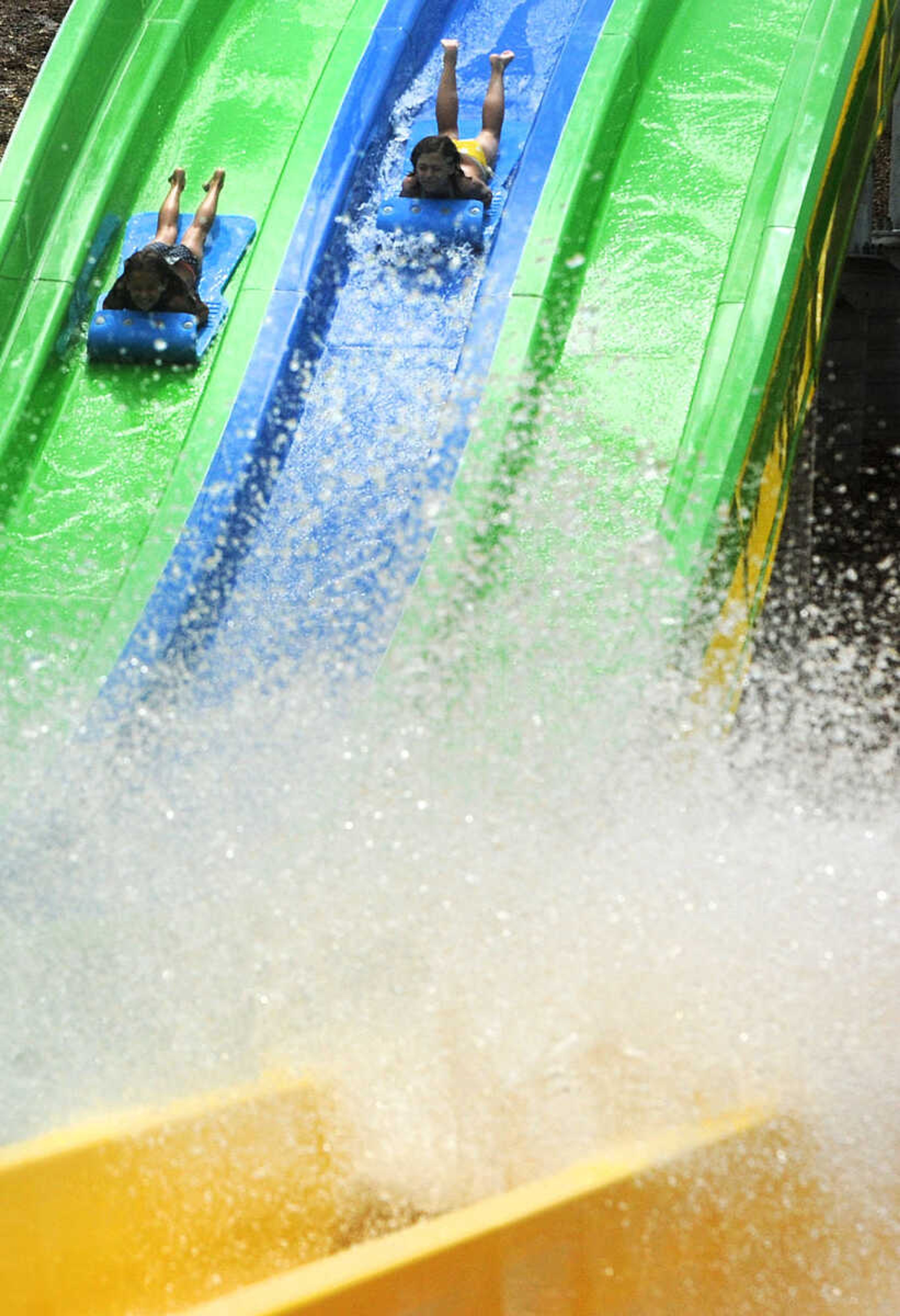 LAURA SIMON ~ lsimon@semissourian.com

The Cape Girardeau Parks and Recreation Department opened the new 265-foot-long free-fall slide, 259-foot-long triple-drop slide and a three-Lane 319-foot-long mat racer with 30-foot tower, at Cape Splash Family Aquatic Center, Thursday, July 9, 2015.