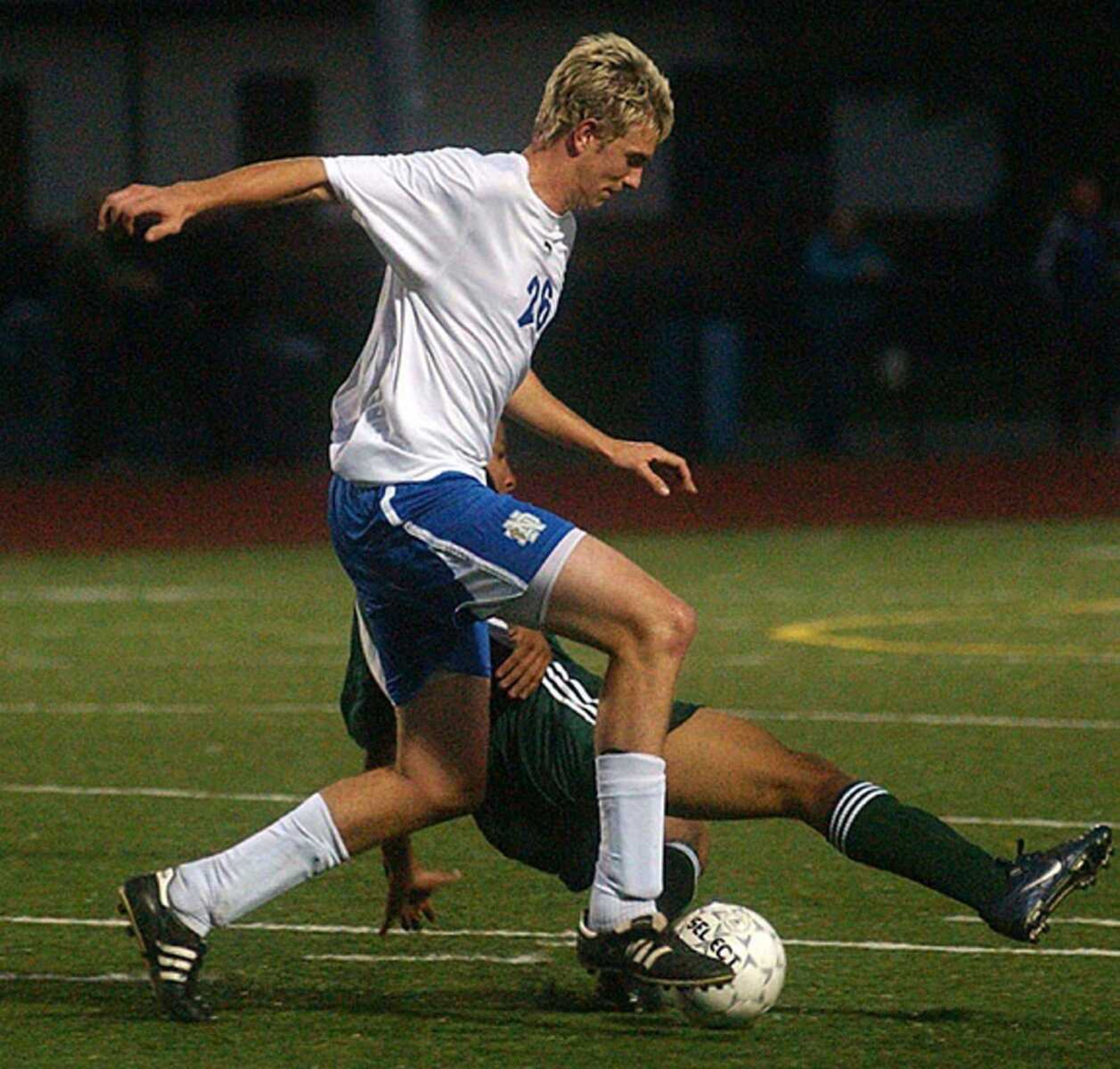 Notre Dame's Ryan Willen went around a De Soto defender during their Class 2 District 1 championship game Wednesday in Farmington. (Andrew Jansen/Special to the Southeast Missourian)