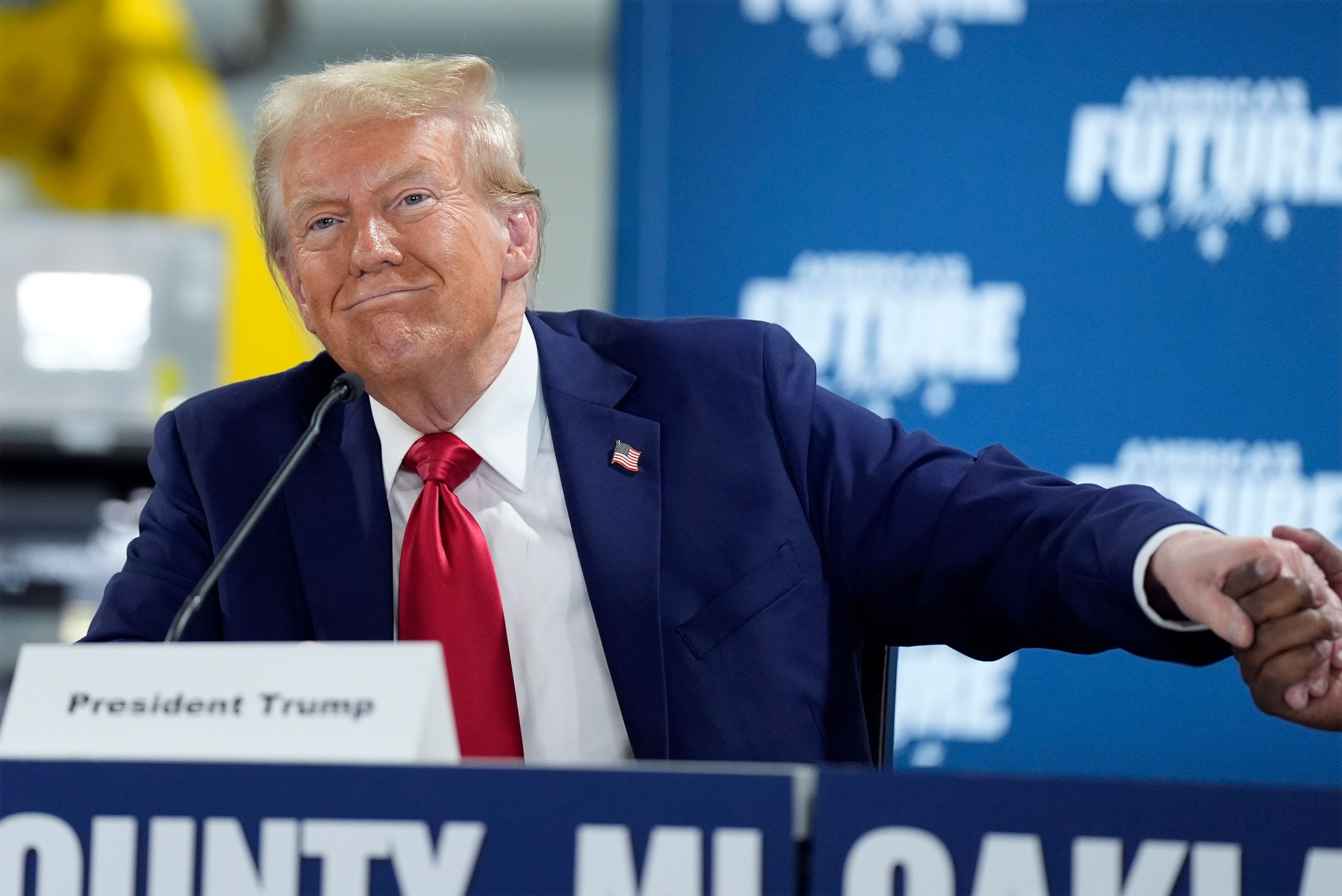 Republican presidential nominee former President Donald Trump arrives at a campaign roundtable, Friday, Oct. 18, 2024, in Auburn Hills, Mich. (AP Photo/Evan Vucci)