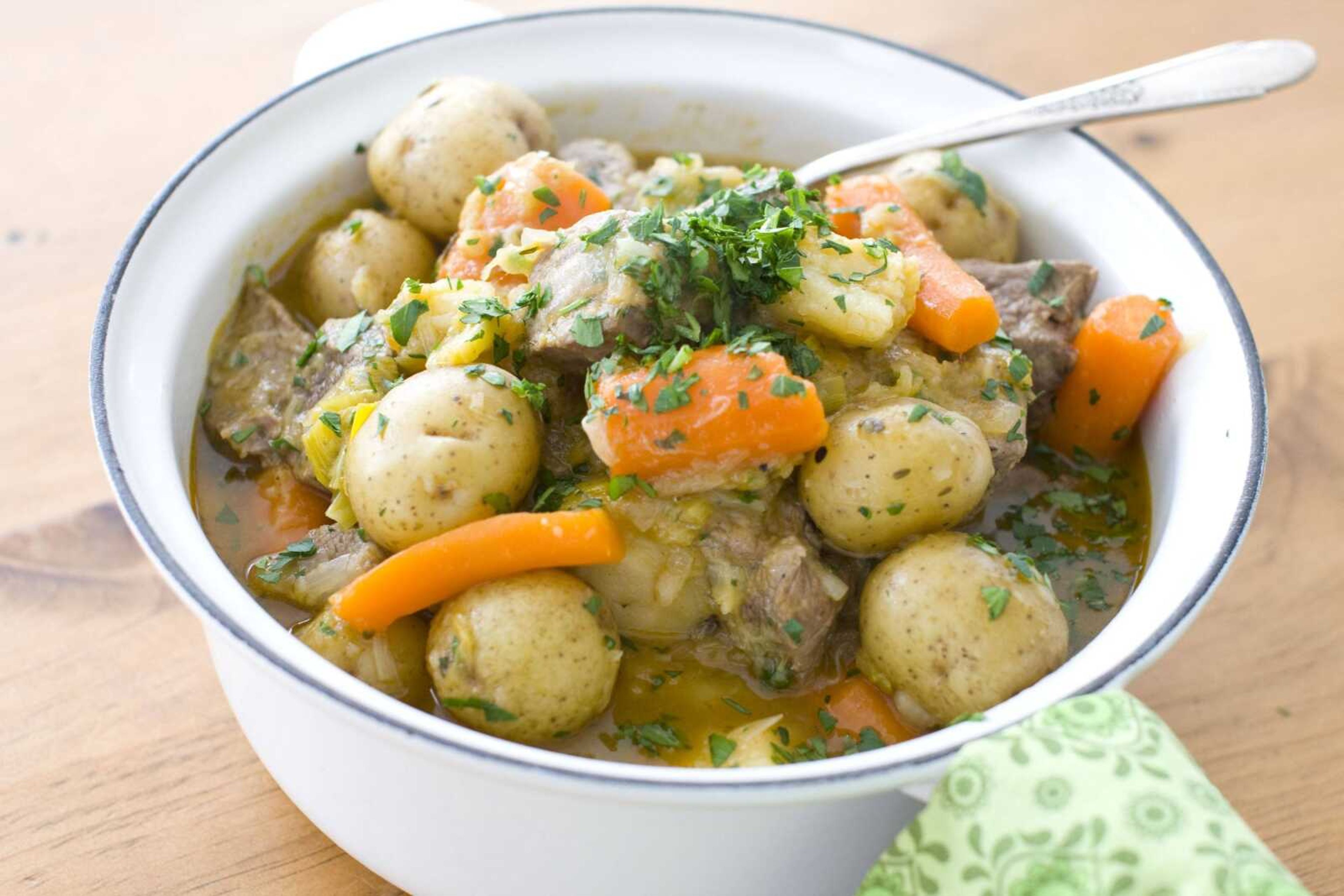 A pot of lamb stew with potatoes, onions and carrots, is shown. (AP Photo/Matthew Mead)