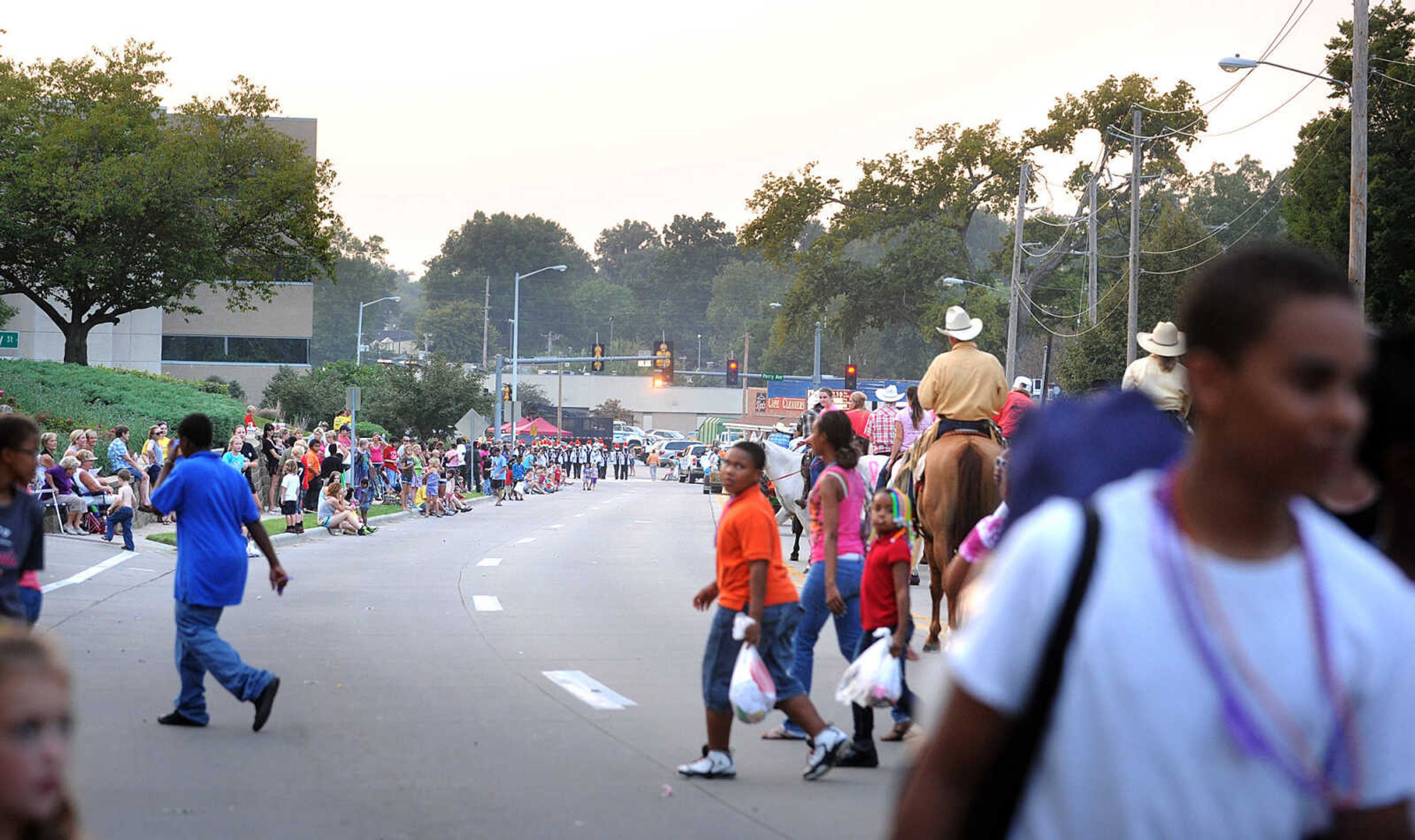 LAURA SIMON ~ lsimon@semissourian.com

The SEMO District Fair Parade moves along Broadway towards Arena Park, Monday, Sept. 9, 2013, in Cape Girardeau.