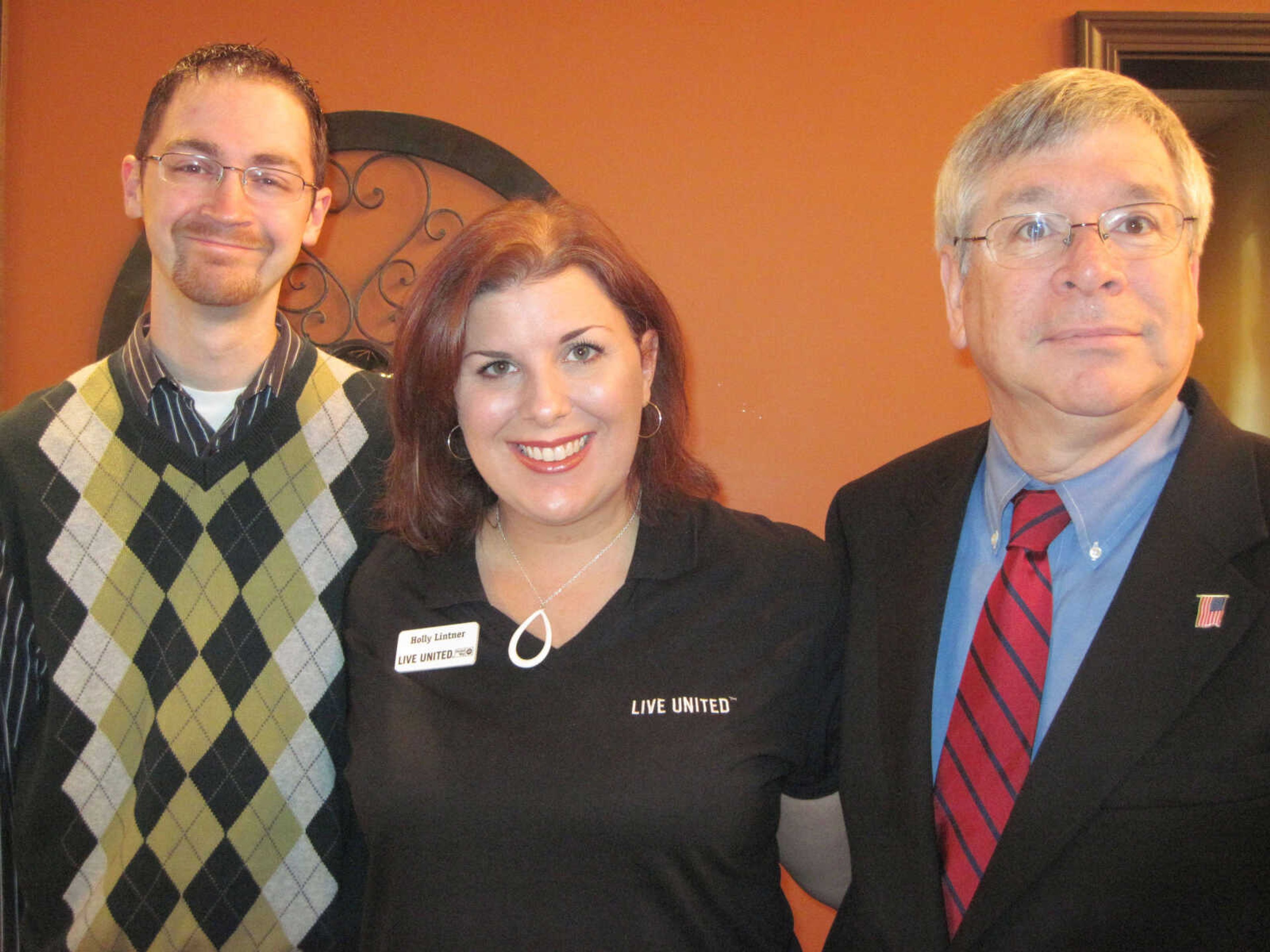 Scott R. Clark, Holly Lintner and Wayne Wallingford attend the Jackson Chamber of Commerce Business Breakfast at Creative Edge on Friday, April 9, 2010.