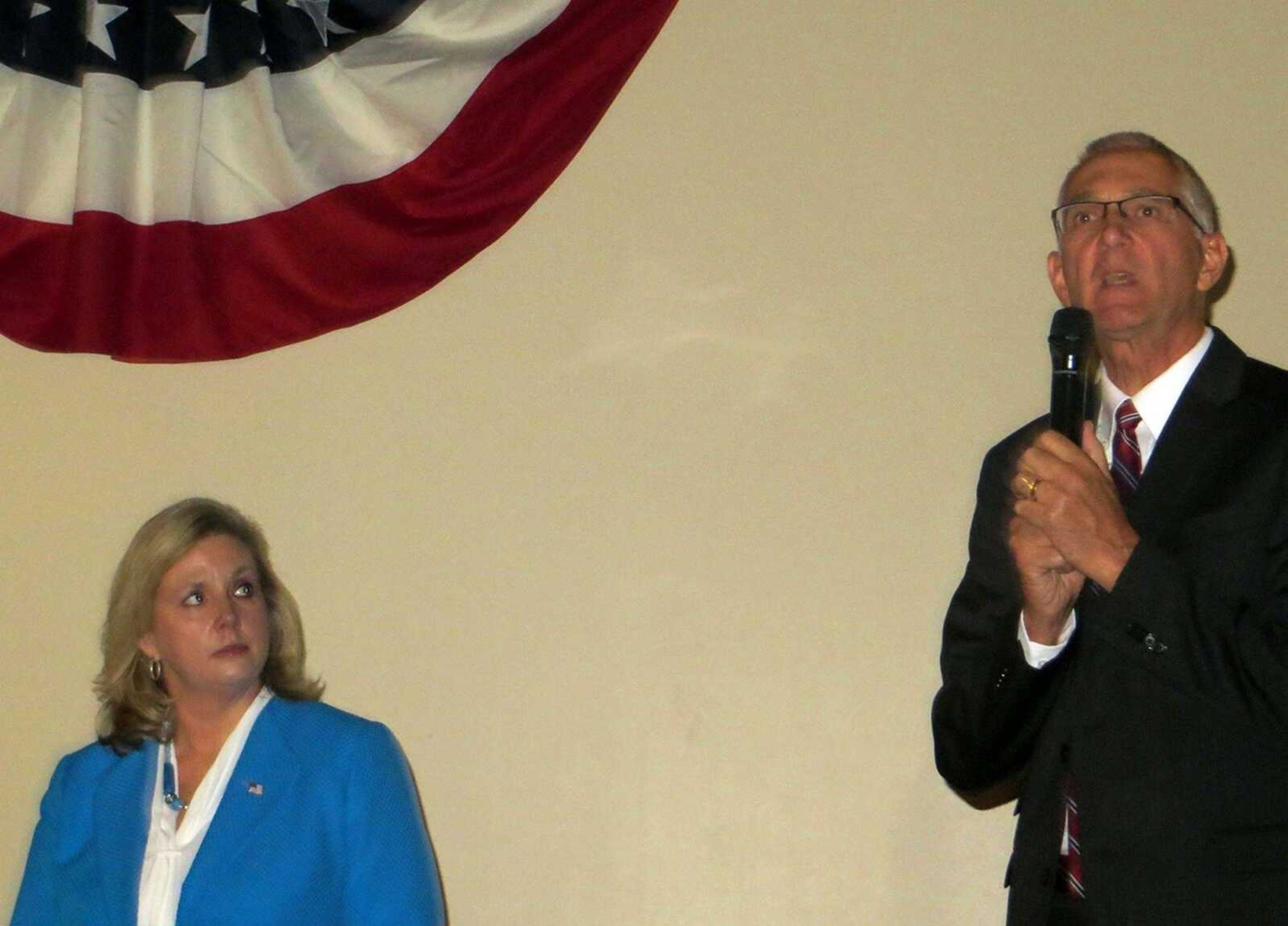 Catherine Hanaway listens as fellow Missouri gubernatorial candidate Roy Asbury speaks during a candidates' forum Saturday night in Poplar Bluff, Mo. (Tyler Graef)