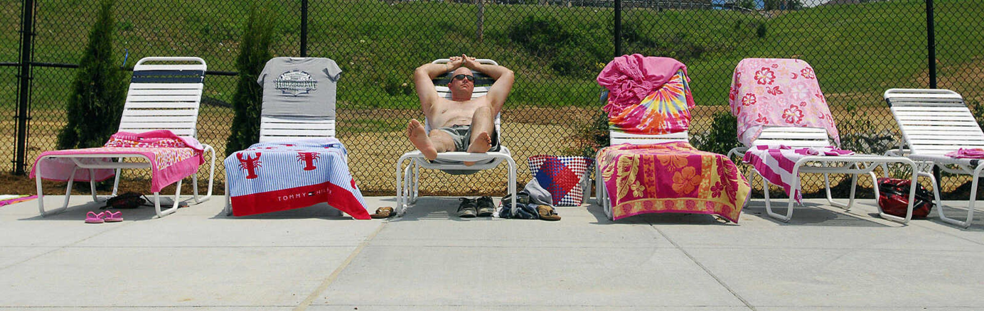 LAURA SIMON~lsimon@semissourian.com
Robert Rodgers of Sikeston sunbathes Saturday, May 29, 2010 at Cape Splash Family Auquatic Center.