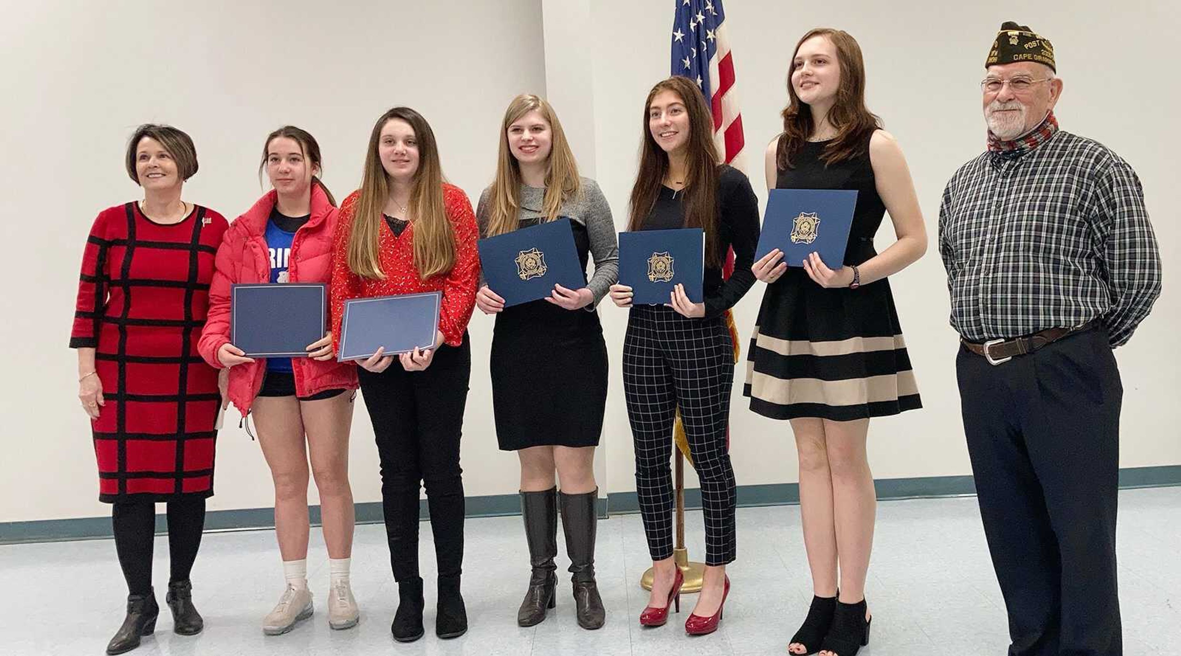 VFW Post 3838 and Auxiliary recently hosted its annual reception for the Patriot's Pen and Voice of Democracy essay contest winners. Pictured are from left, Donna Miller, scholarship chair; Patriot Pen winners Tali Renshaw, second place, Trinity Lutheran School; Maggie Hillin, first place, Trinity Lutheran School; and Ailee McKee, not pictured, third place, Trinity Lutheran School. Voice of Democracy winners were Rachel Keele, third place, Cape Girardeau Central High School; Sydney Gartman, second place, Eagle Ridge Christian School; and first place, Hailey Janssens, Eagle Ridge Christian School. Also pictured is Bill Humphries, Senior Vice Commander Post 3838.