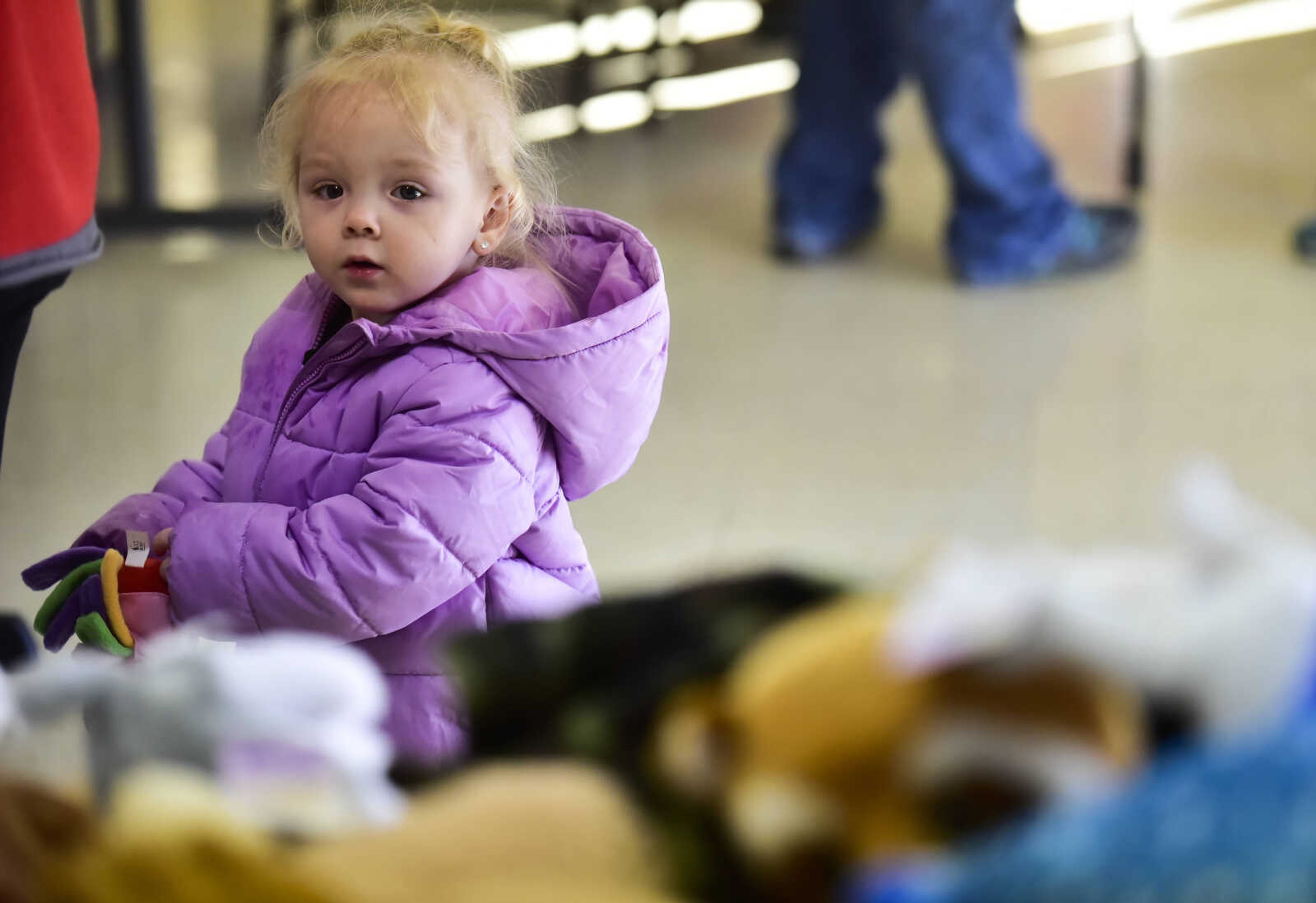 Viedah Pierce, 2, looks towards a table of stuffed animals Friday, Dec. 15, 2017, at Elks Lodge #2652 in Jackson.