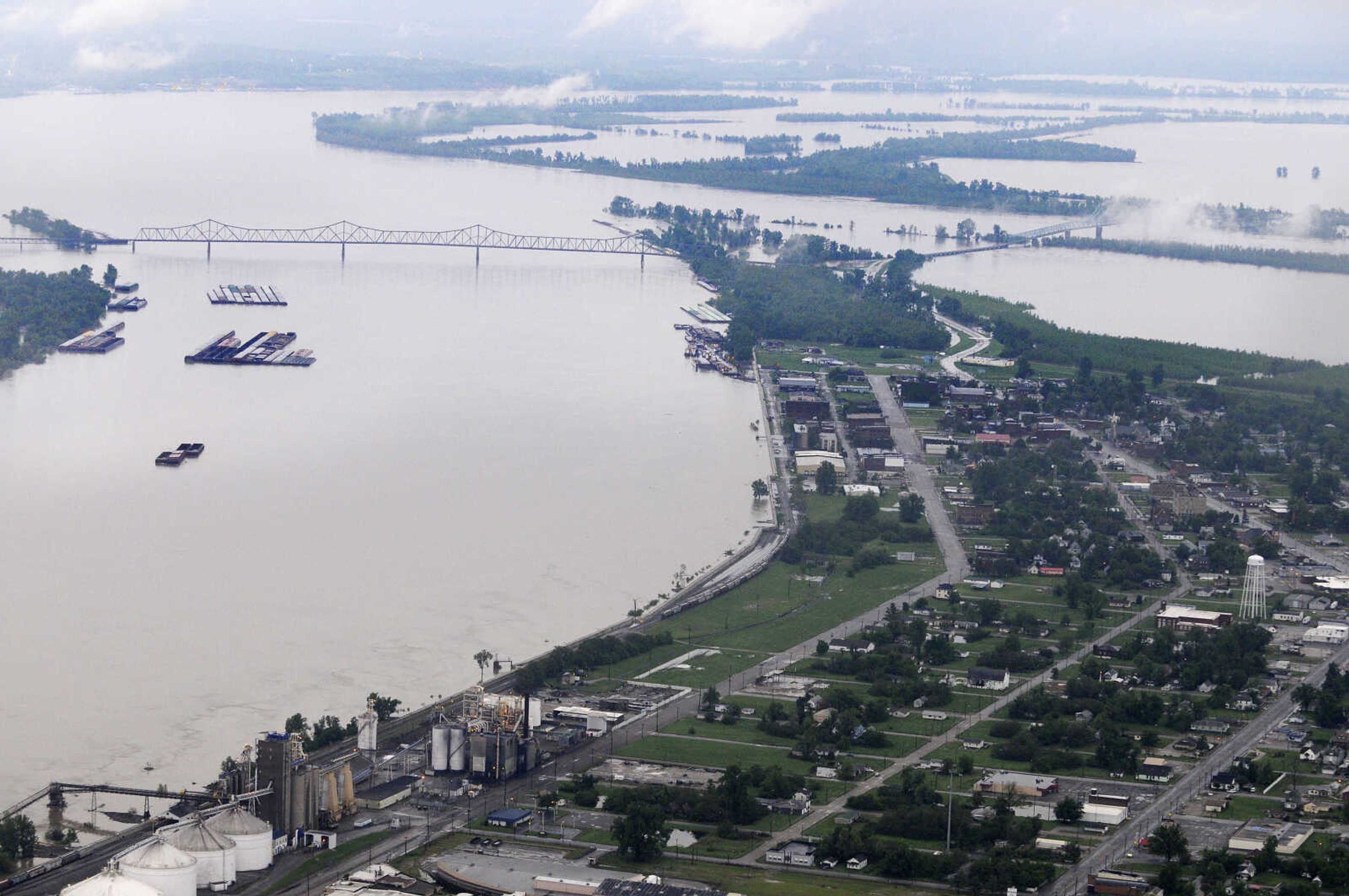 KRISTIN EBERTS ~ keberts@semissourian.com

Cairo, Ill., sits surrounded by water on Tuesday, May 3, 2011. The Birds Point-New Madrid floodway can be seen at the top right. On May 2, Maj. Gen. Michael Walsh gave the order to intentionally breach the Birds Point levee, flooding over 130,000 acres of farmland to ease flooding upstream.