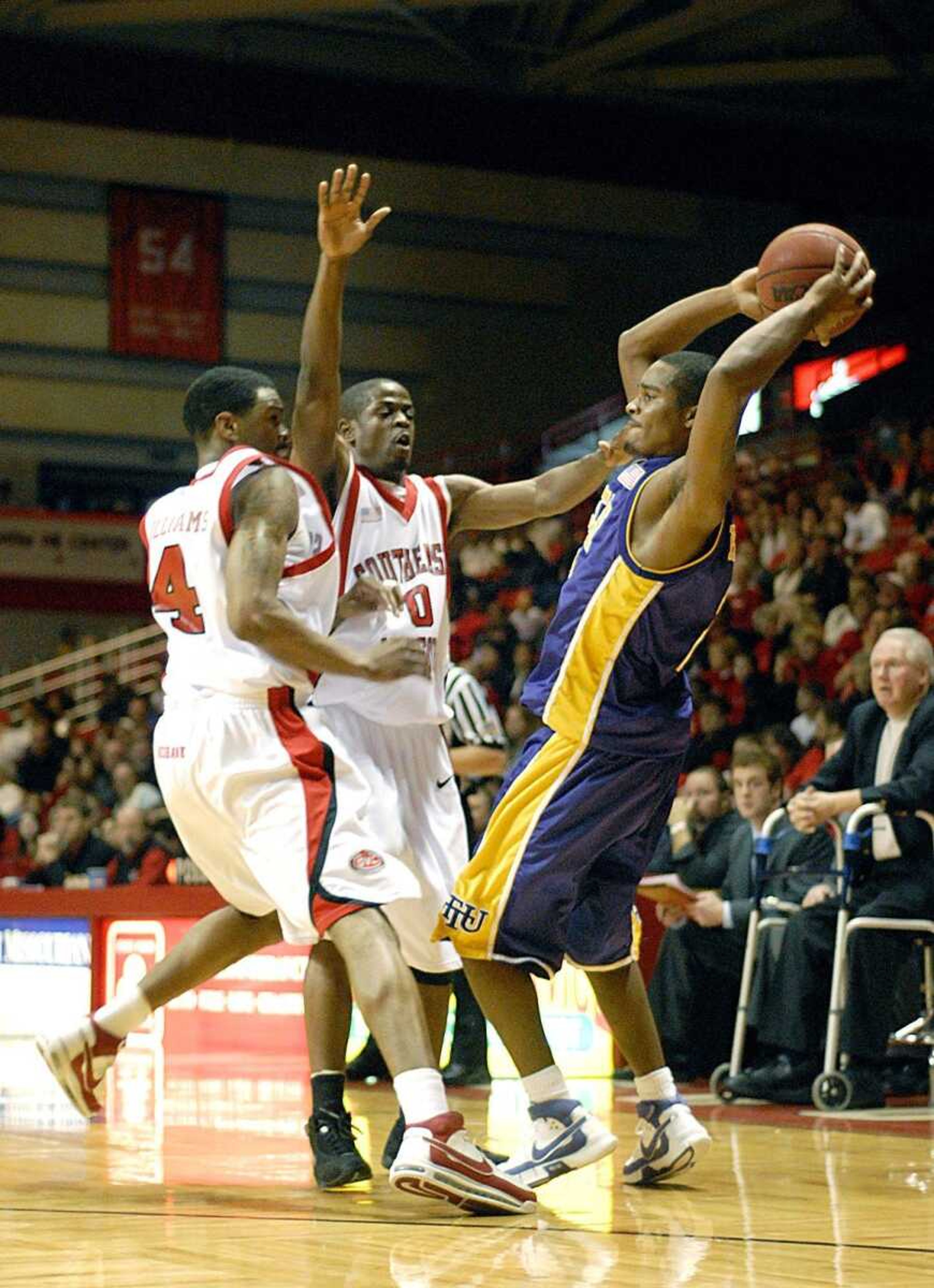 Calvin Williams, left, and Kenard Moore closed in on a Tennessee Tech player earlier this season at the Show Me Center. (Aaron Eisenhauer)