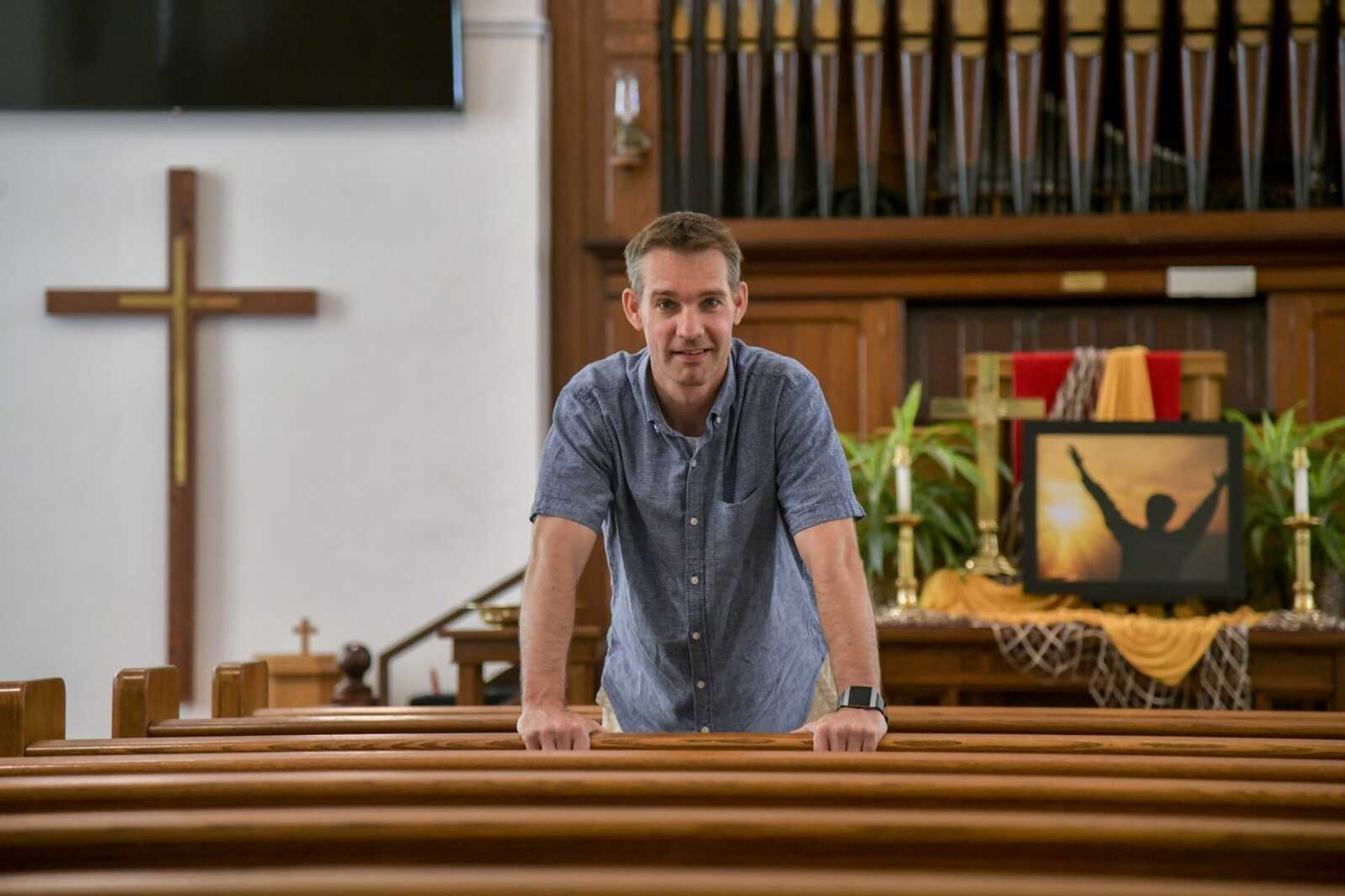 Newly ordained pastor Scott Griffin poses Wednesday for a portrait in the sanctuary of the Zion United Methodist Church in Gordonville.