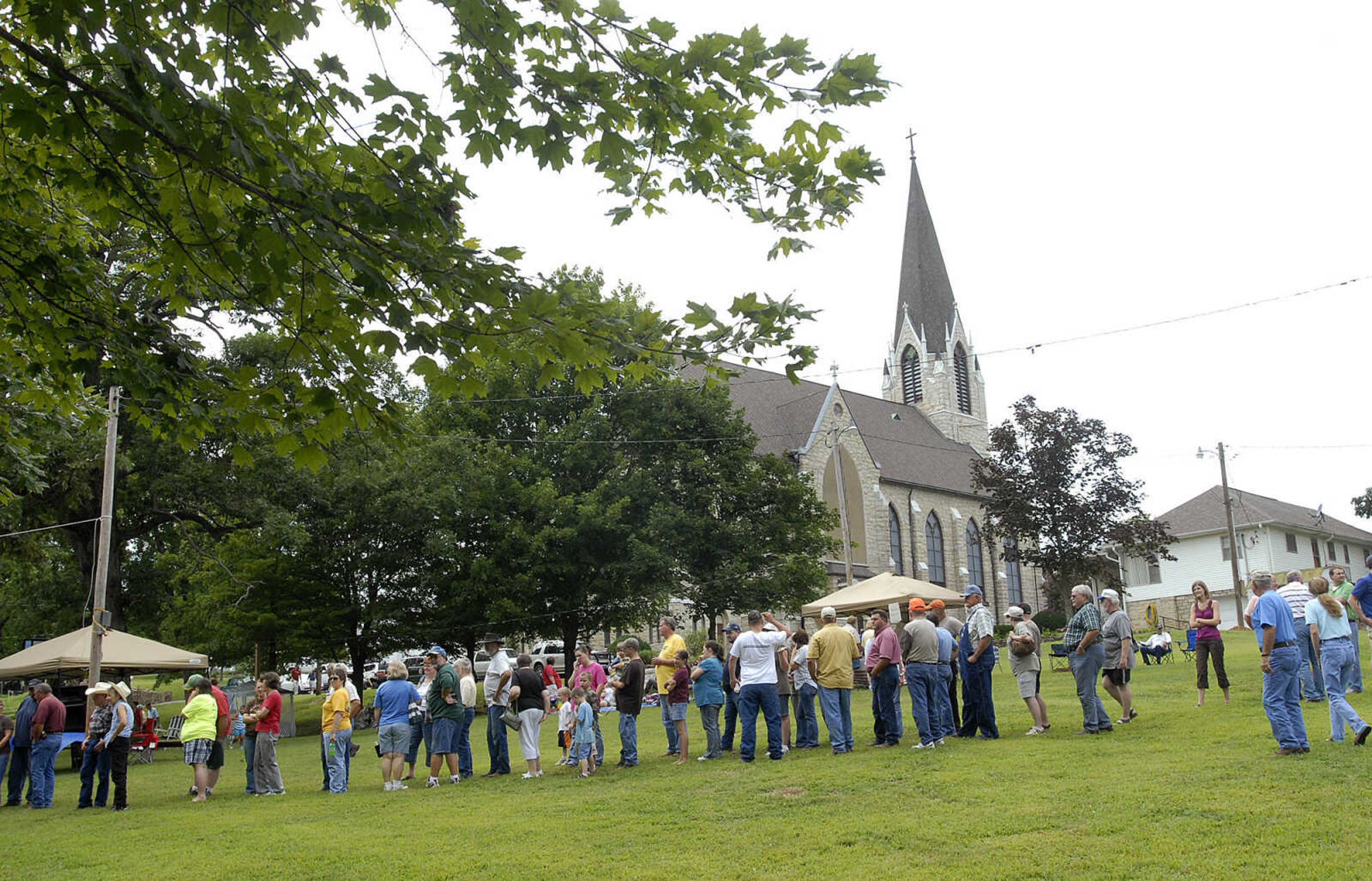 The dinner line stretches back toward St. John's Catholic Church which sponsors the Leopold Picnic.