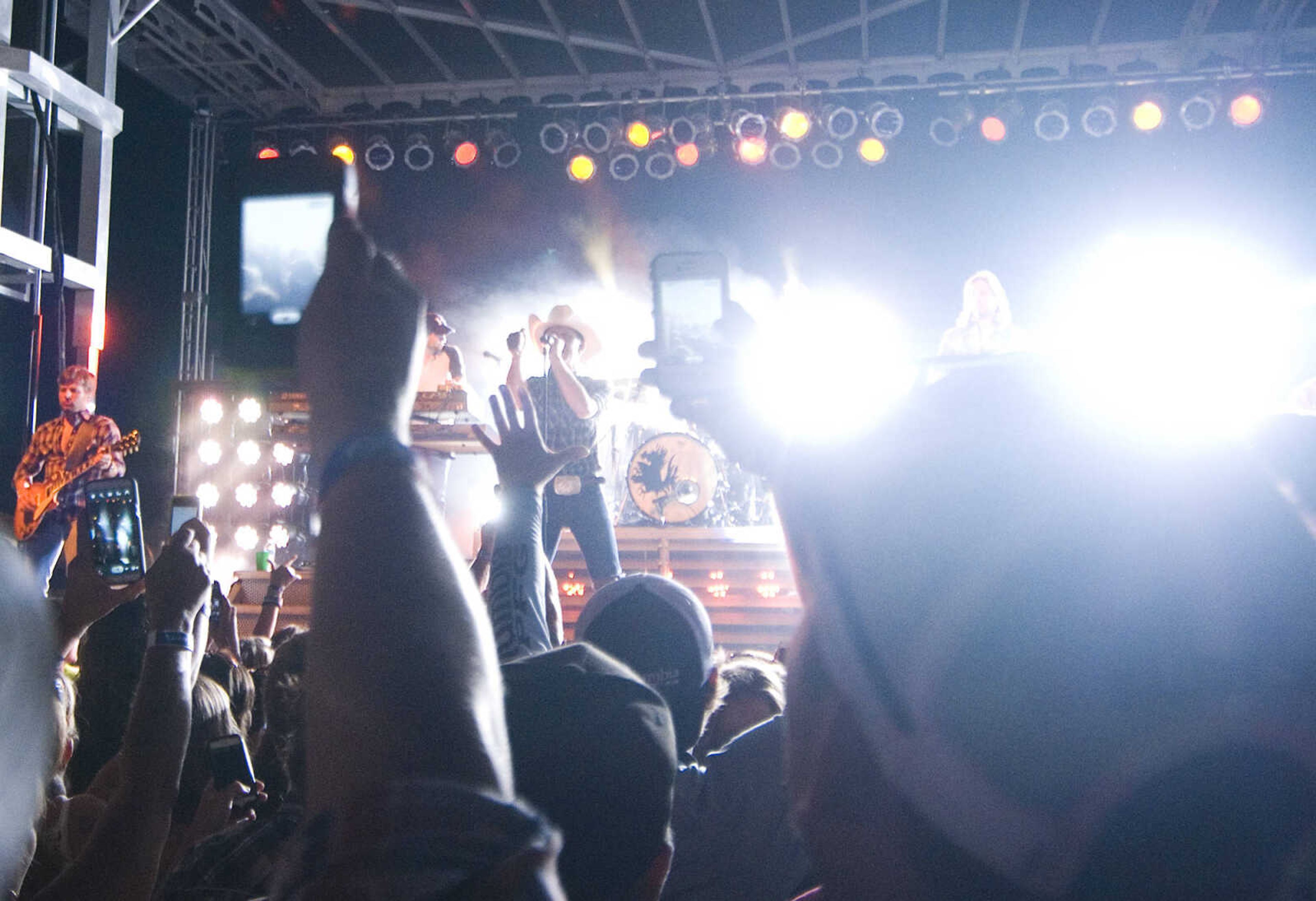 AARON EISENHAUER ~ photos@semissourian.com

Country music star Justin Moore performs for fans on the outdoor stage at Bootheel Harley-Davidson on Friday, July 12, 2013 in Scott City.