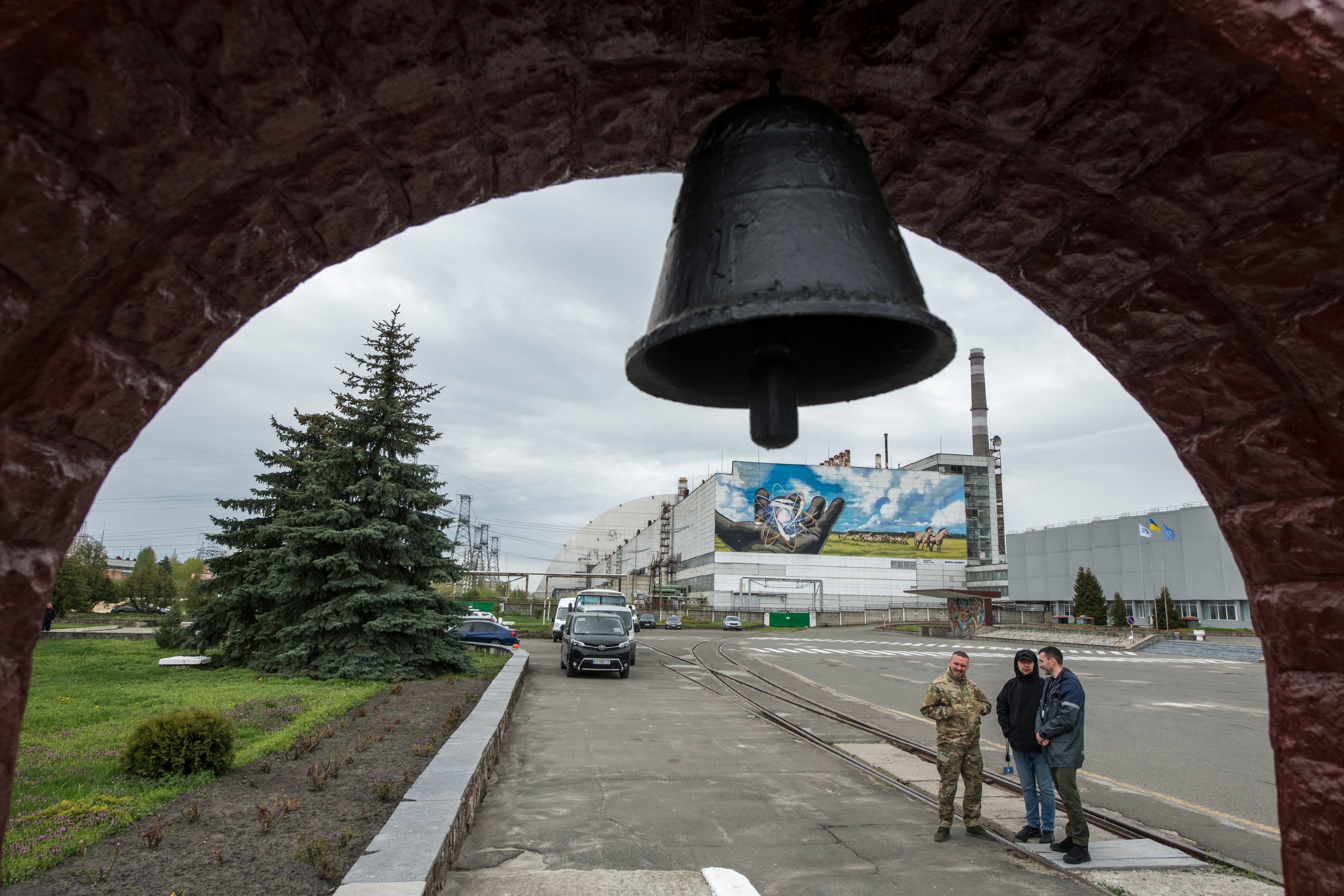 FILE - This April 26, 2023, file photo, shows Ukraine's Chornobyl nuclear power plant seen from a memorial to victims of a 1986 meltdown. To this day, the area around the plant, known in Russian as Chernobyl, is off-limits except to the technical staff needed to keep it safe. (AP Photo/Wladyslaw Musiienko)