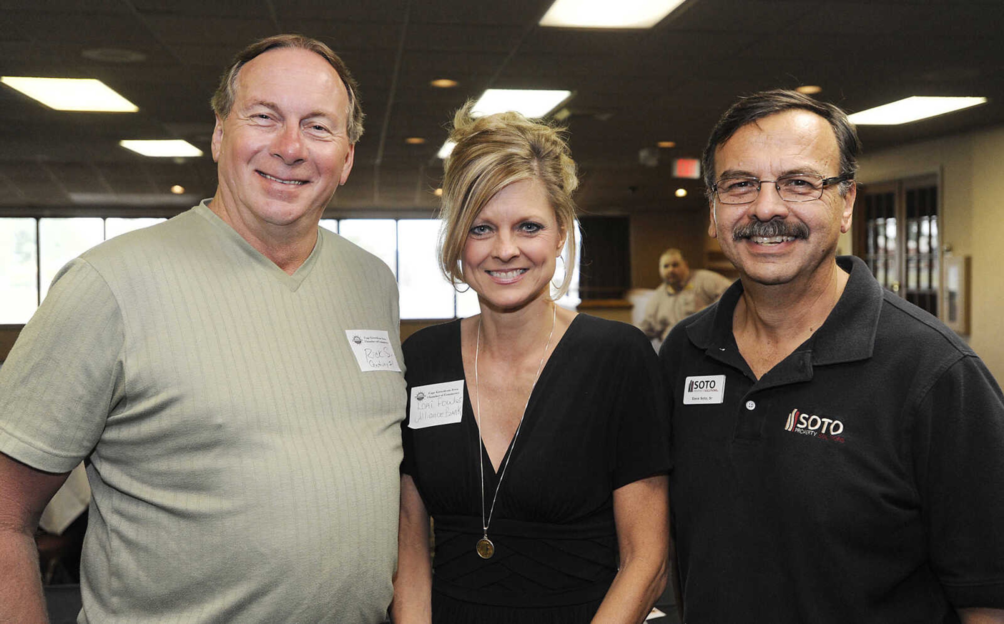 Rick Sinclair, left, Lori Fowler and Dave Soto at the Cape Girardeau Area Chamber of Commerce Business After Hours Tuesday, August 21, at Ray's Plaza Conference Center, 3257 William St.